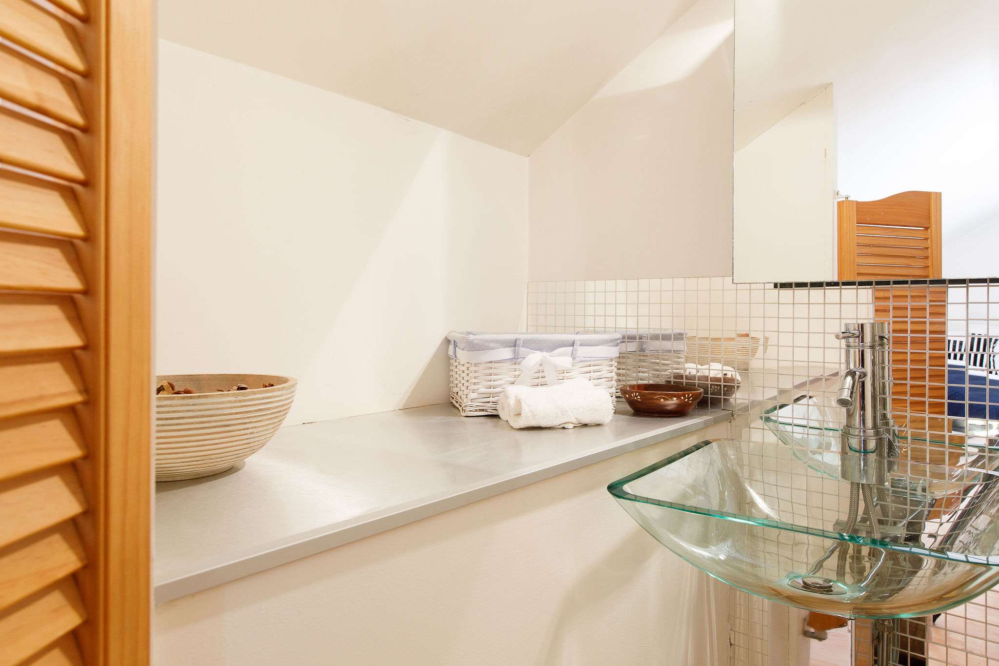 The twin room has a sink to freshen up before bed.