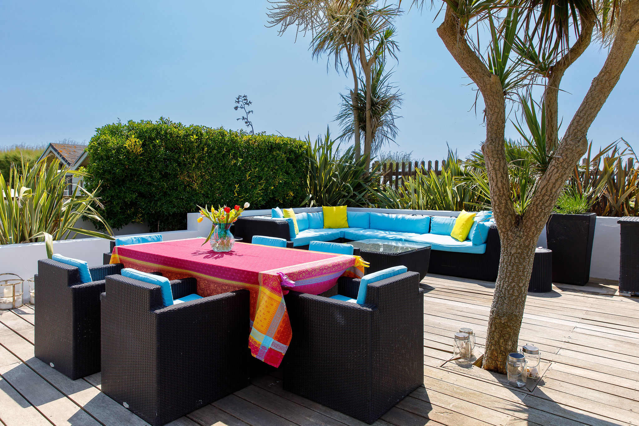 The outside area has huge decking with plenty of seating both in the shade and sun.