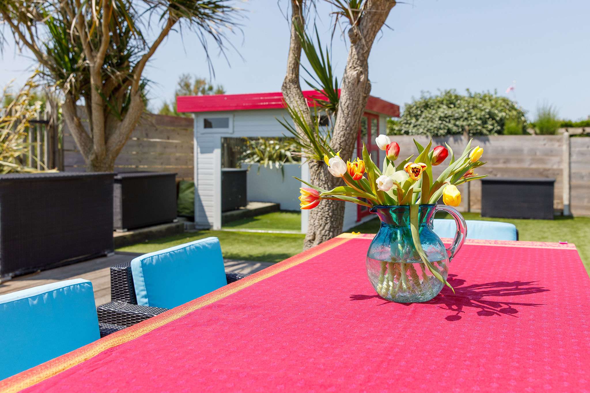 Pops of colour give the garden a vibrant and tropical feel. Cocktails anyone?!
