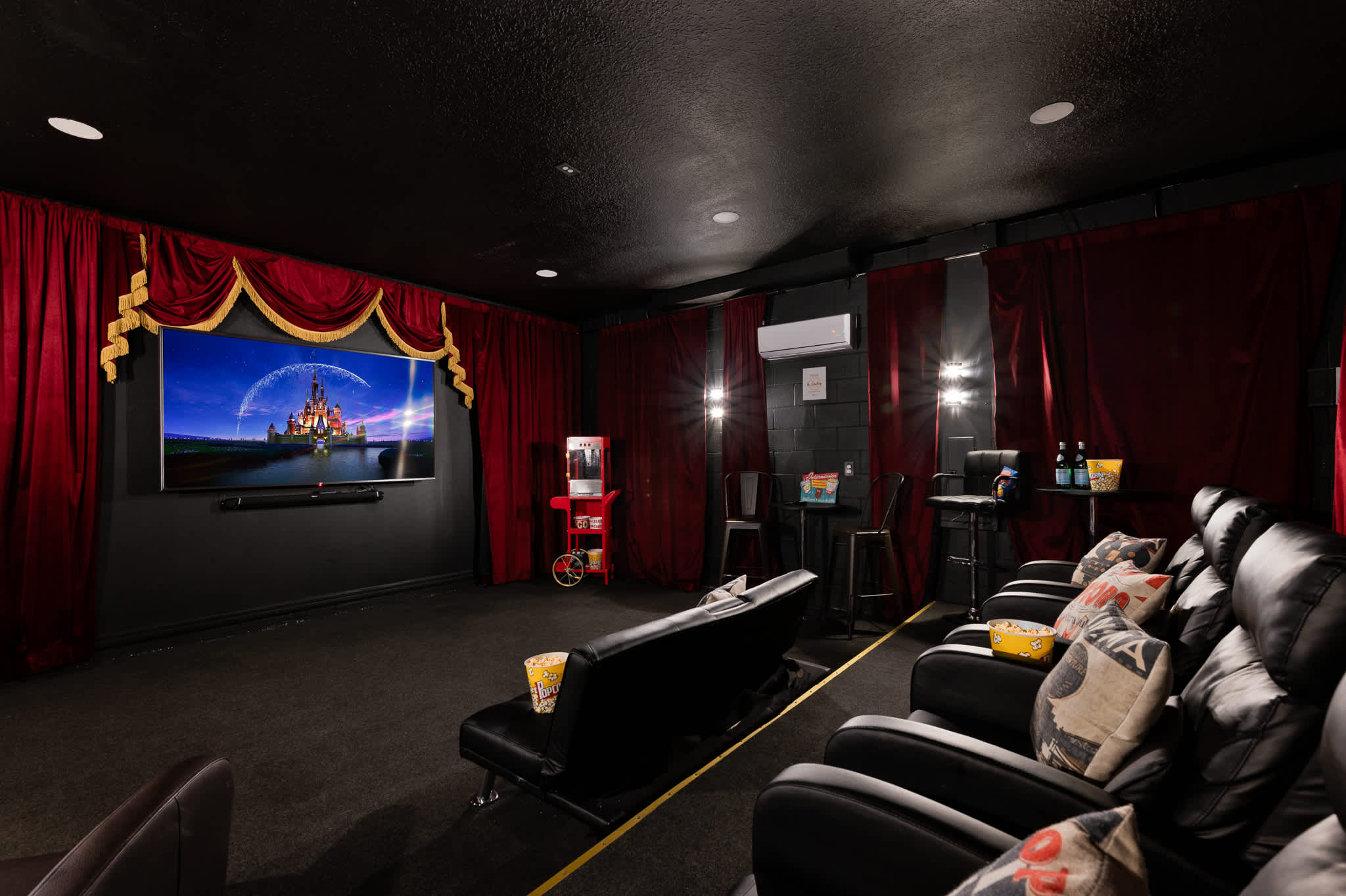 Cozy up with the family in the theater after a long day at the parks!
