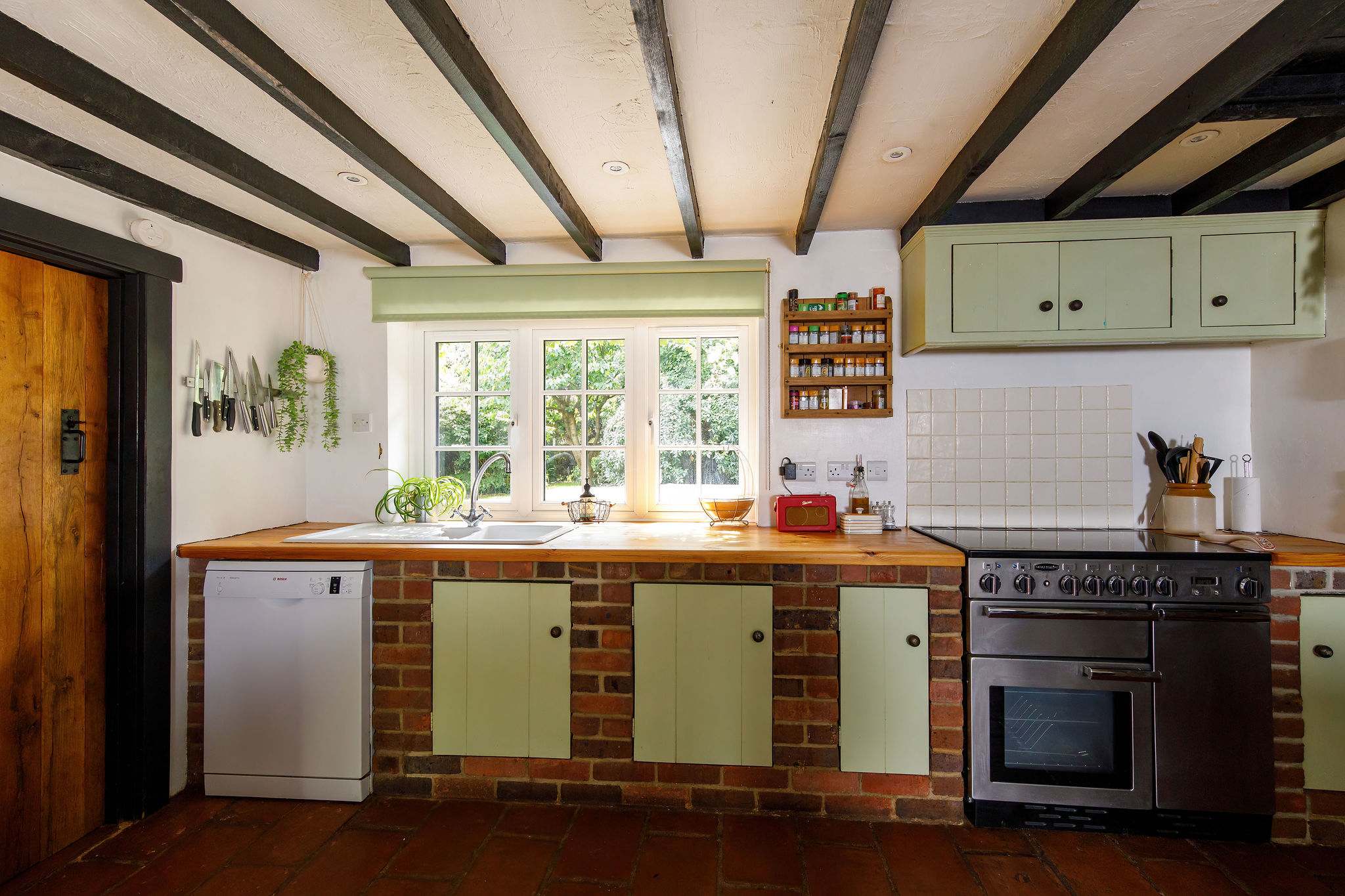 You'll feel right at home in this stunning farmhouse-style kitchen.