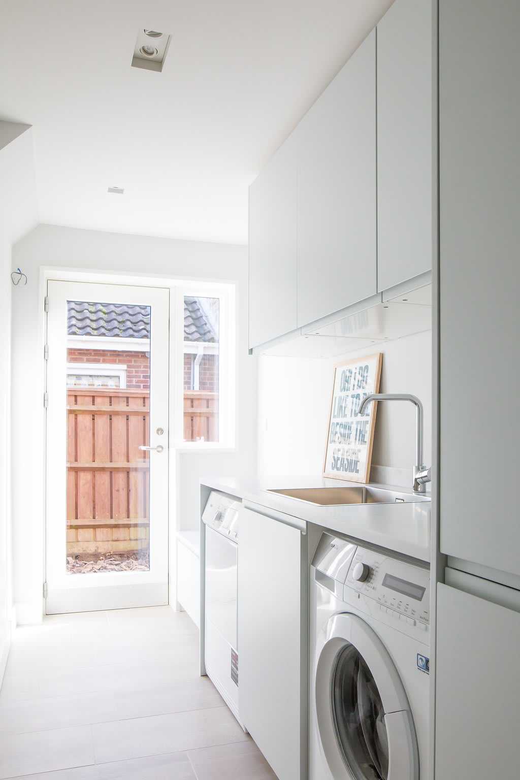 There is a handy utility room with washing machine and dryer to sort holiday washing and beach bags.