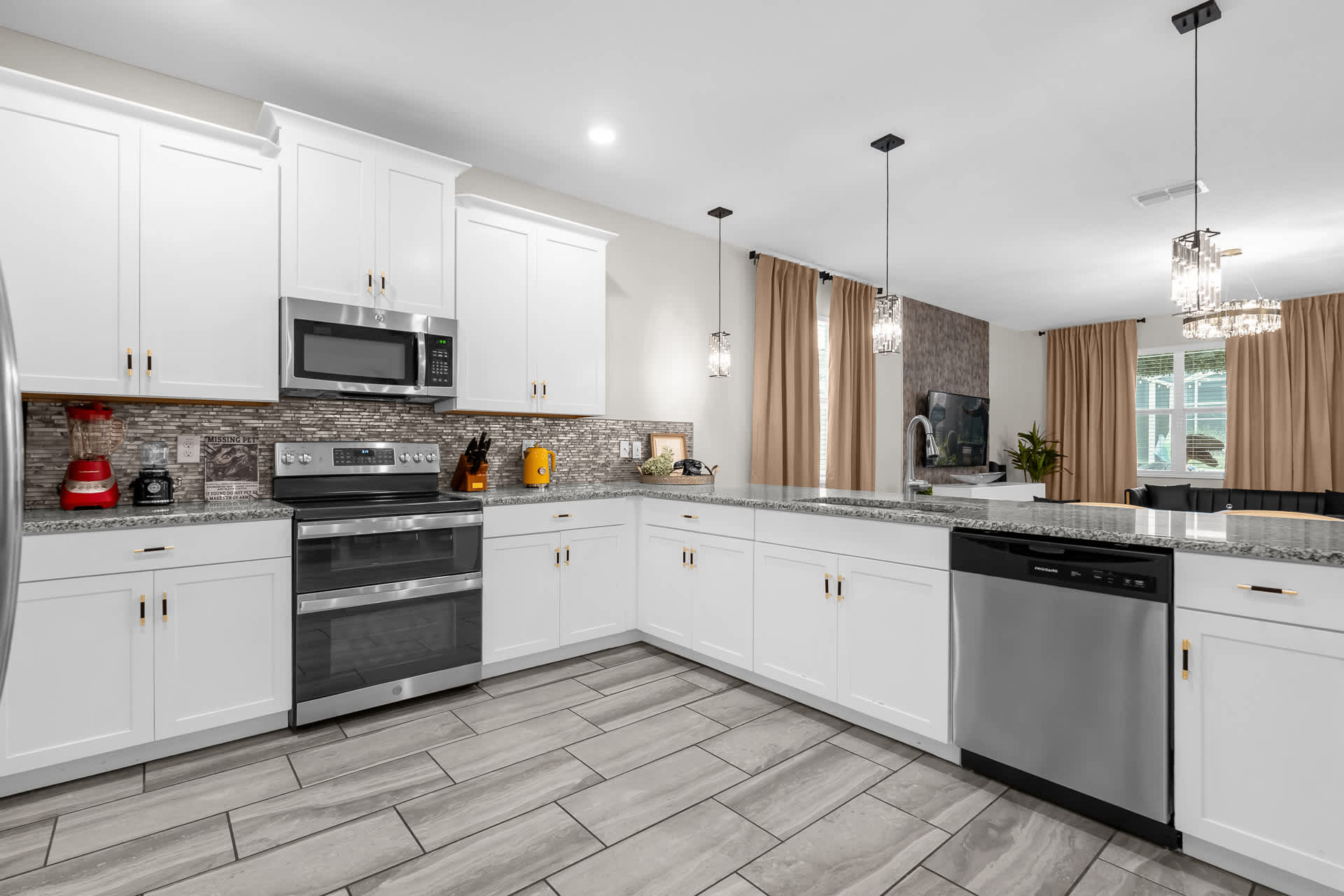 Modern Fully-Equipped Kitchen with Silver Appliances