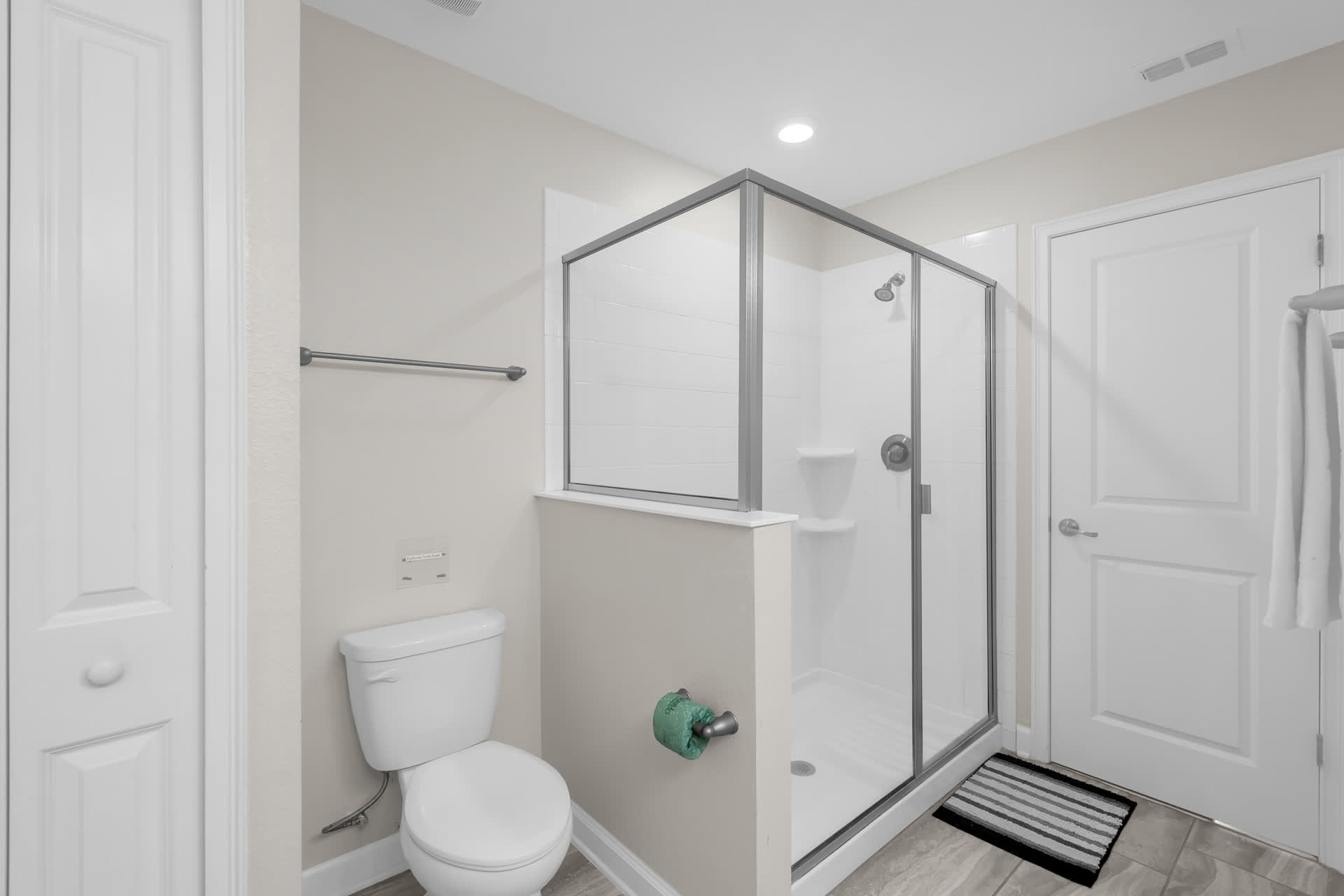En-Suite Bathroom with Standing Shower and Toilet