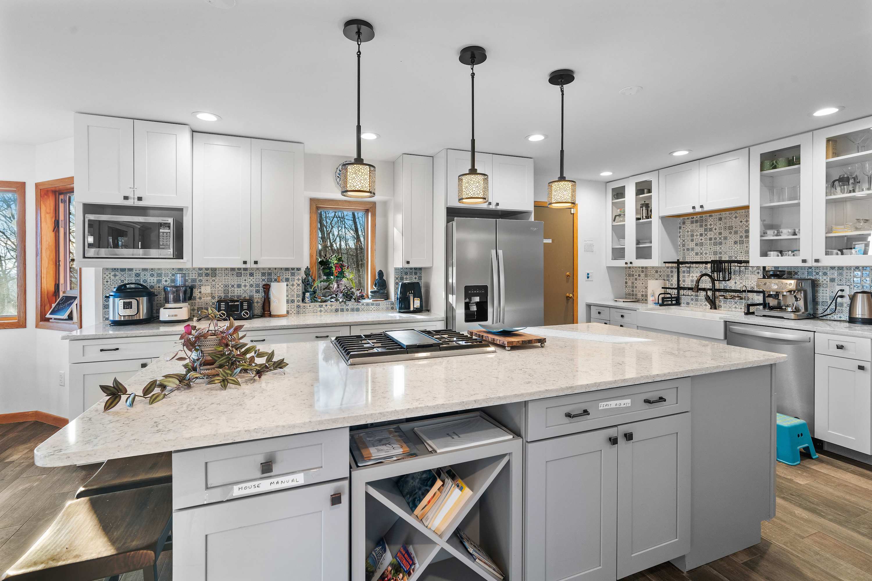 Chef’s Kitchen  – Cook like a pro in this fully stocked, modern kitchen, complete with top-tier appliances, a spacious island, and all the essentials for your short-term rental stay!
