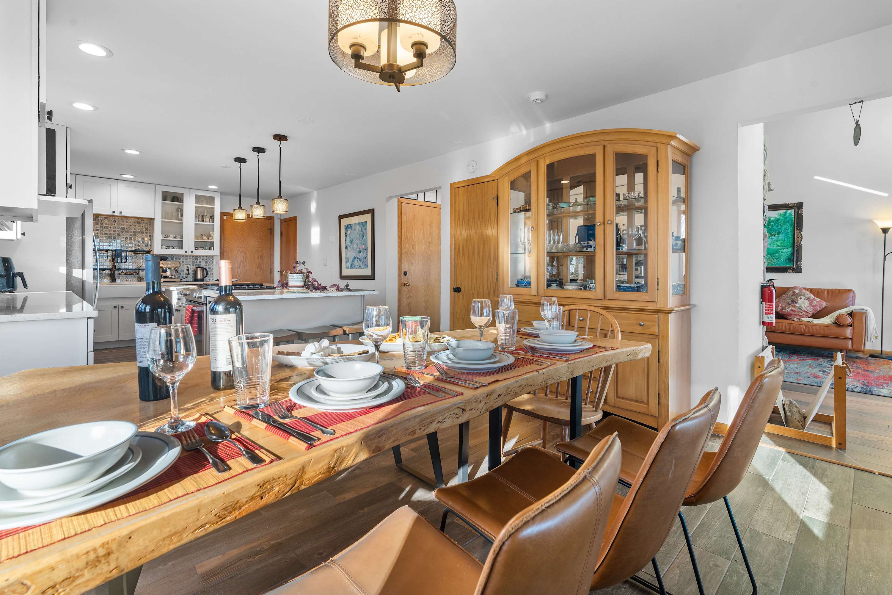 Dining in Style – Gather around this beautiful live-edge dining table for a meal to remember. Perfect for group stays and family retreats!