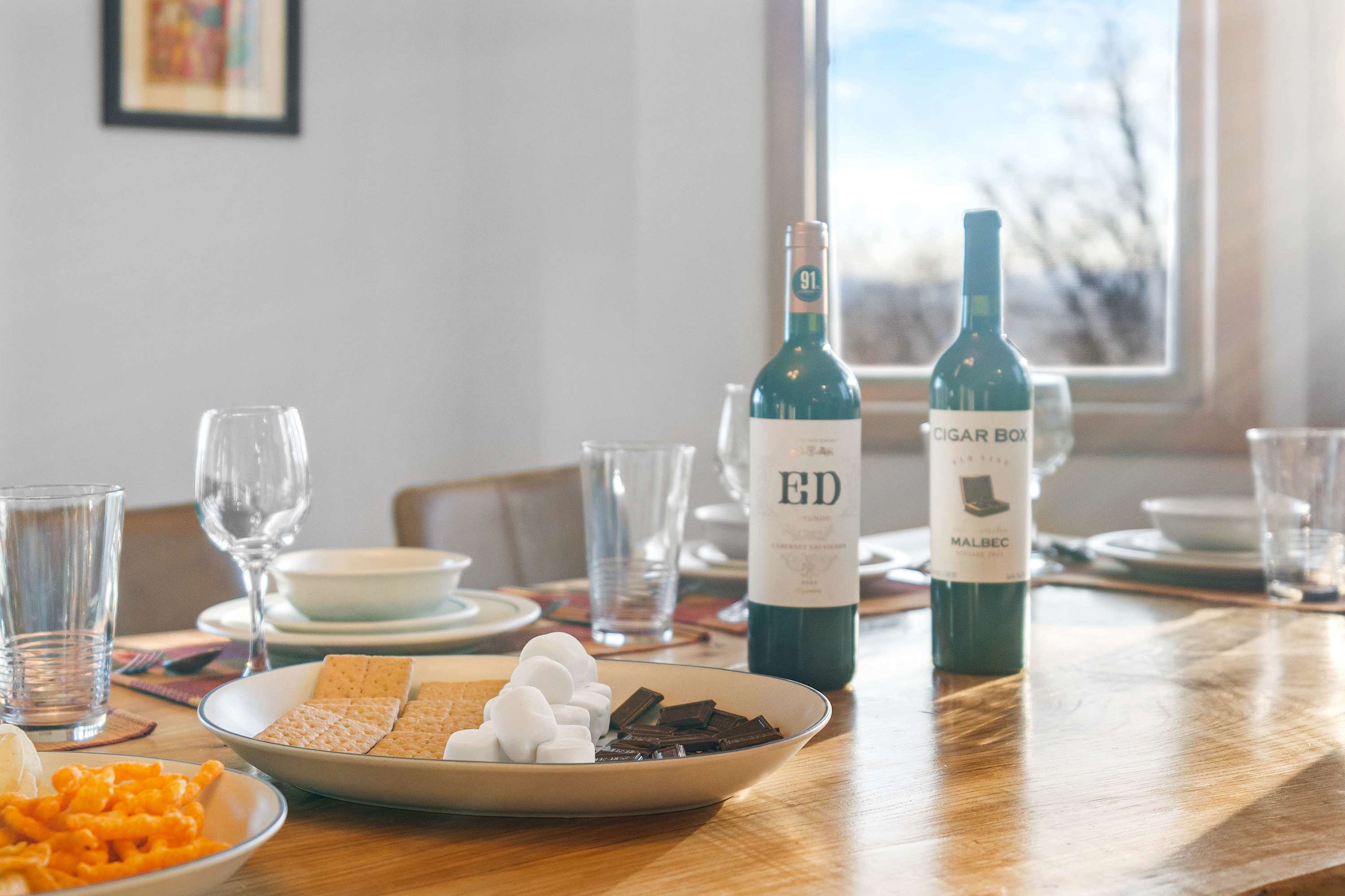  Wine, Dine & Unwind  – Enjoy a cozy night in with good company, delicious treats, and a bottle of wine. Your perfect getaway starts here! 