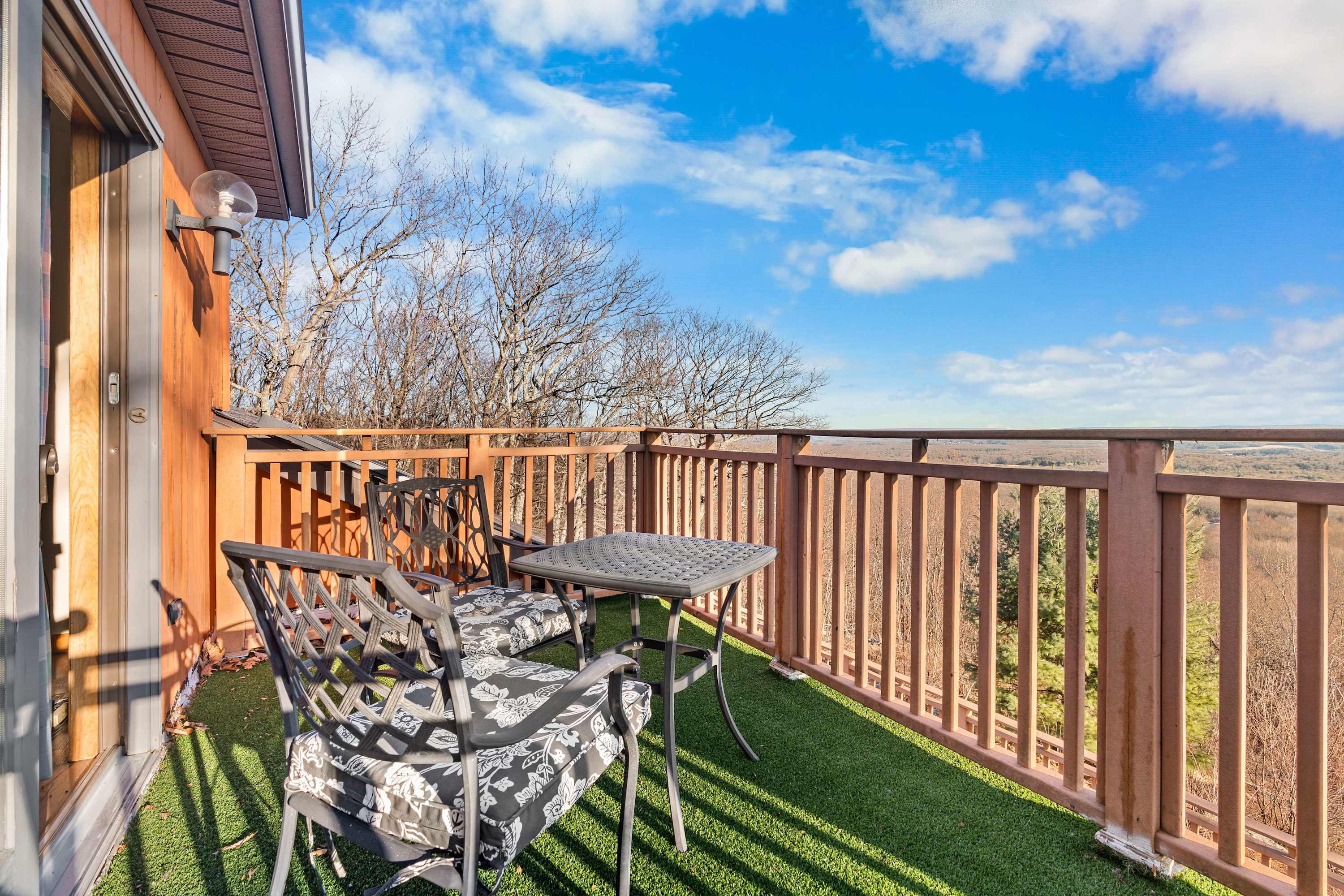 Your private balcony escape awaits! Sip your morning coffee or unwind with a glass of wine while soaking in the breathtaking views. The perfect spot for relaxation! 