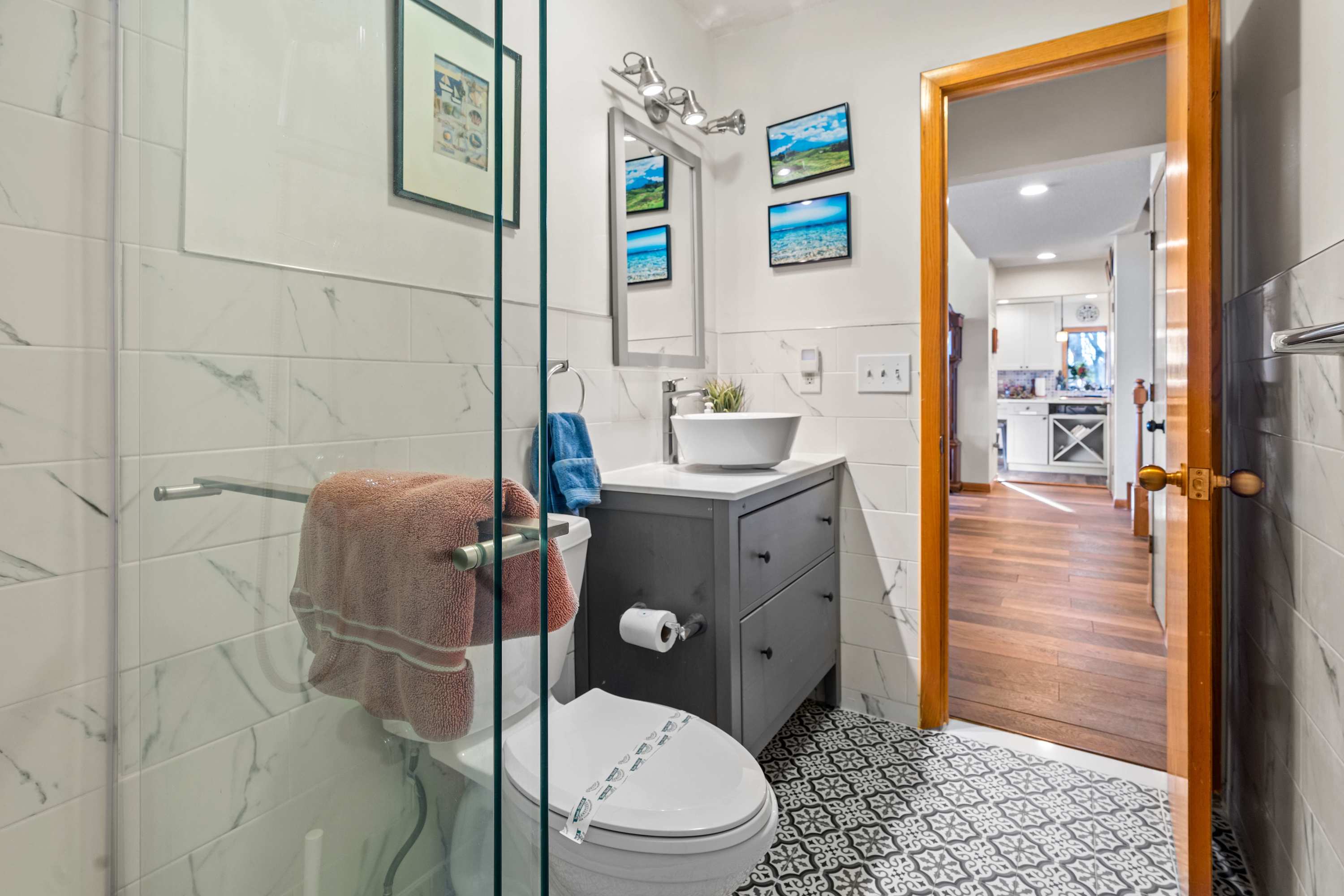 Modern elegance meets comfort in this beautifully designed bathroom.