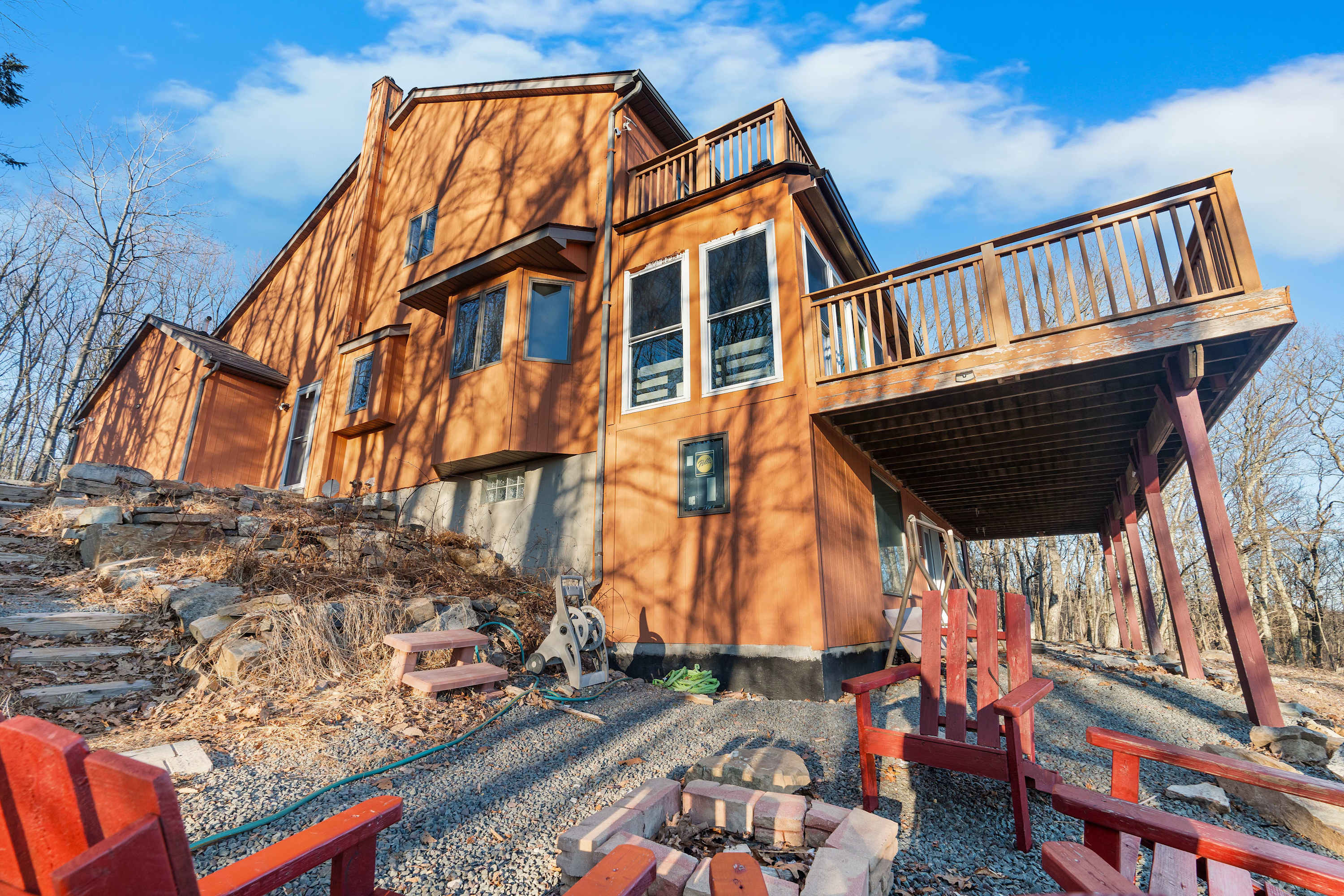 Cozy up by the fire pit and enjoy the peaceful outdoor setting.