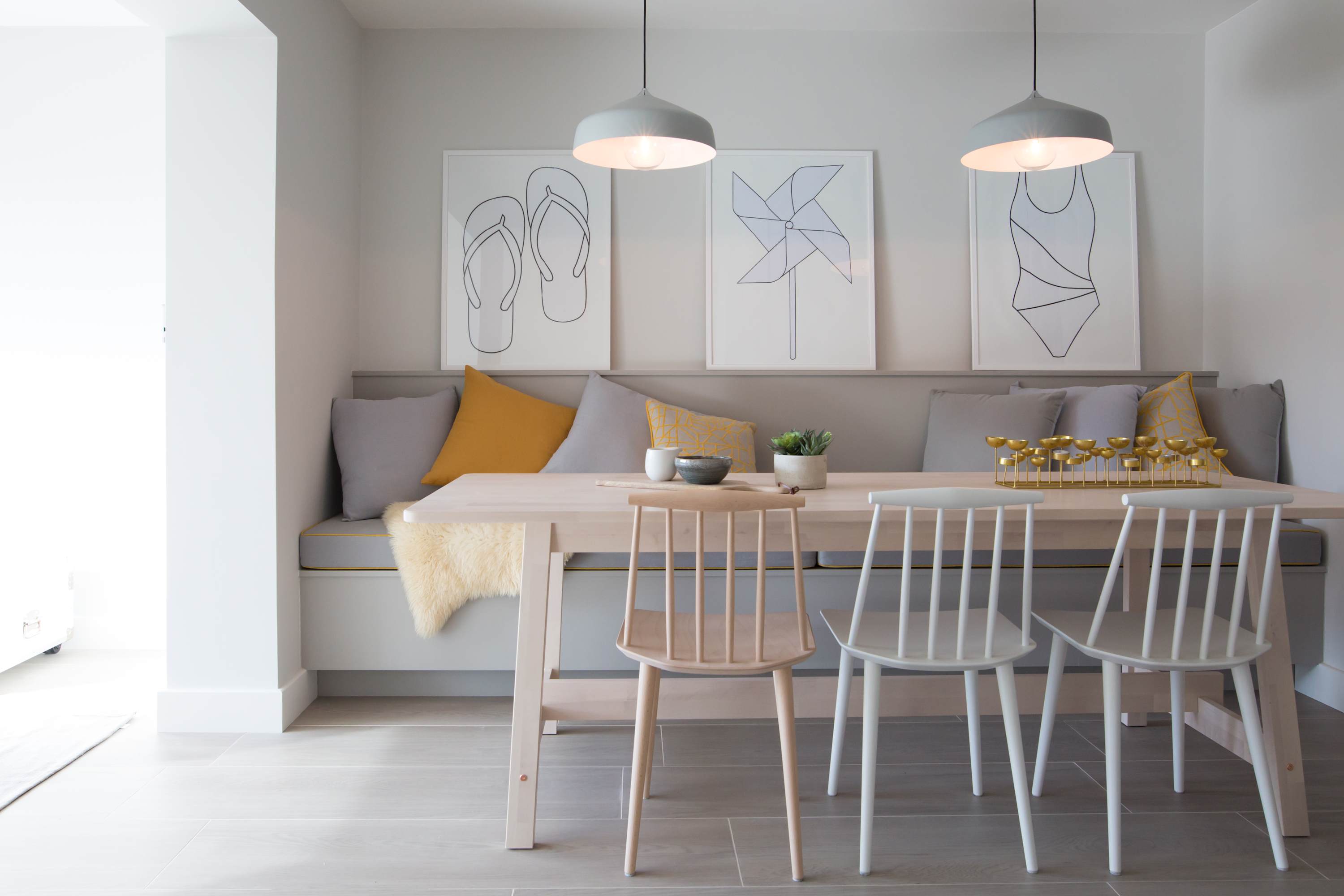 The stylish dining area with bench seating where you can serve delicious feasts for the whole family.