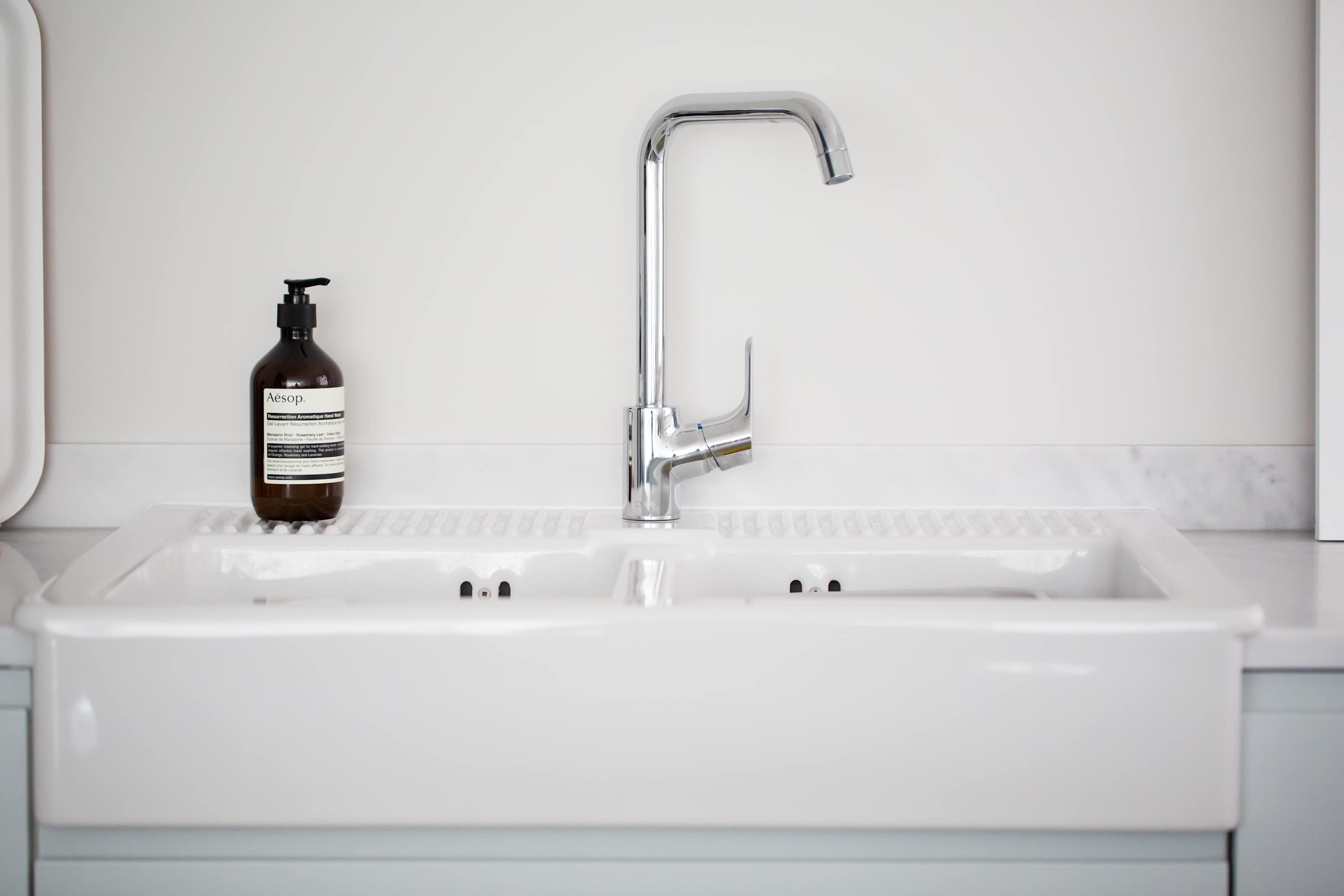 The kitchen has a large butler sink.