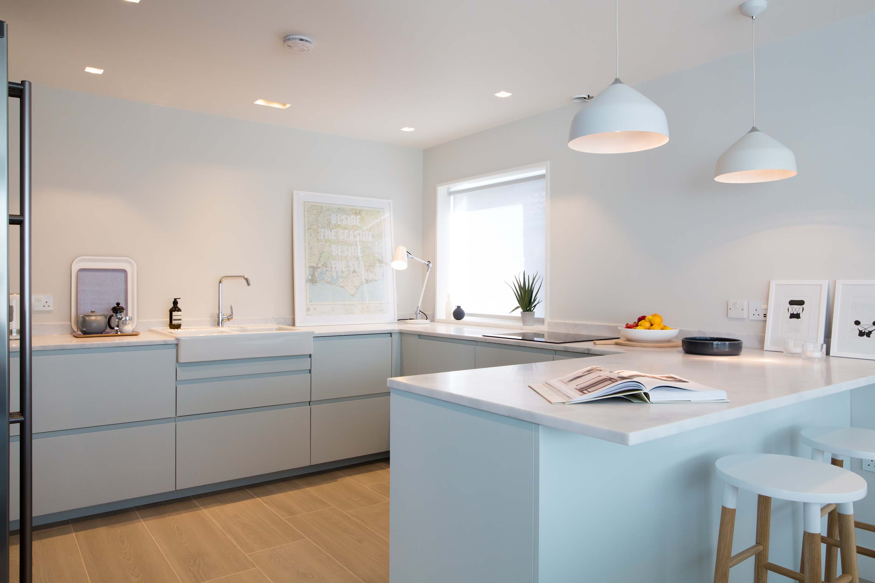 Cook up a storm in the home's fully-equipped kitchen with spacious countertops and breakfast bar.