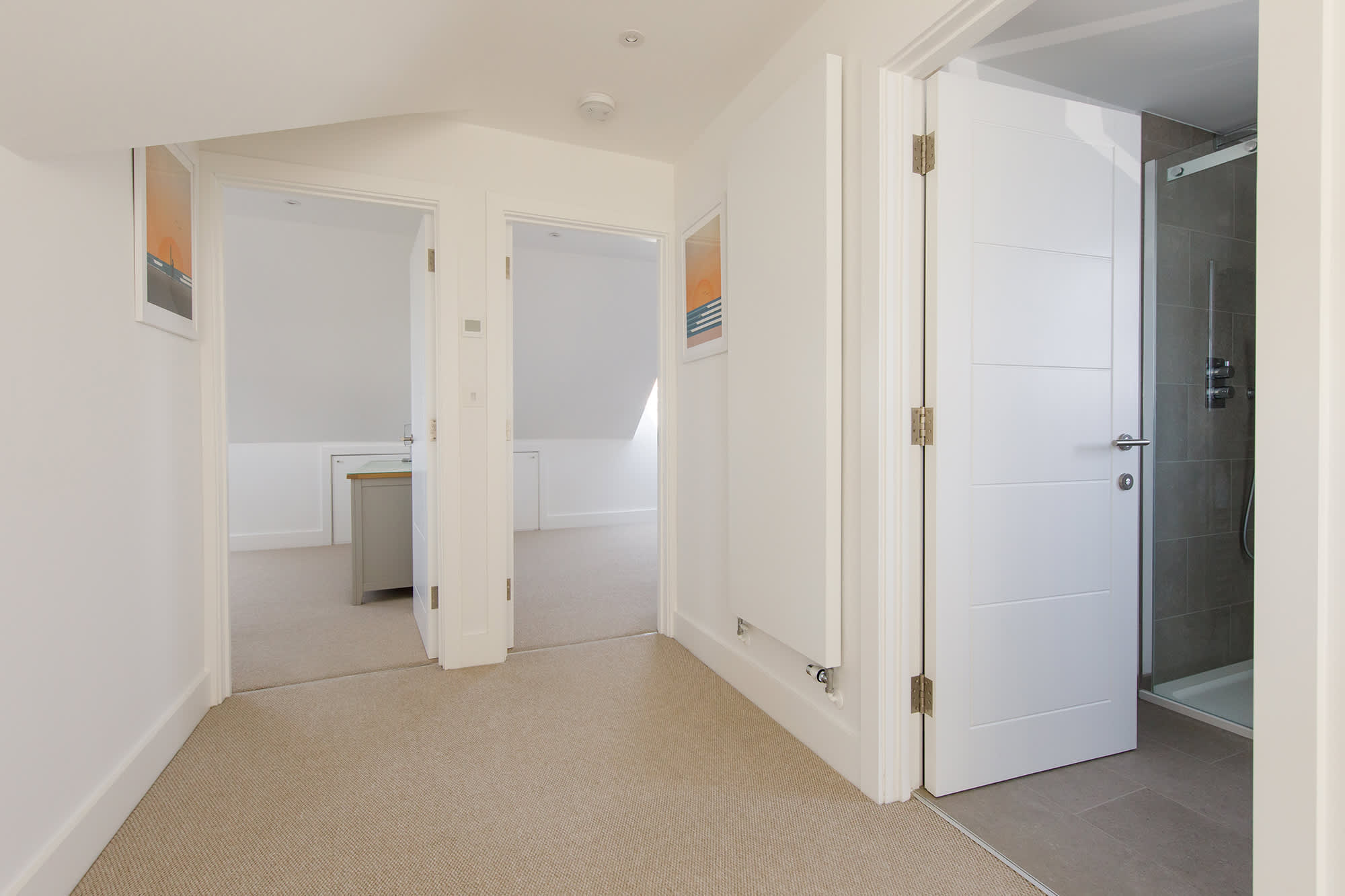 First-floor landing leads to two bedrooms and the family bathroom.