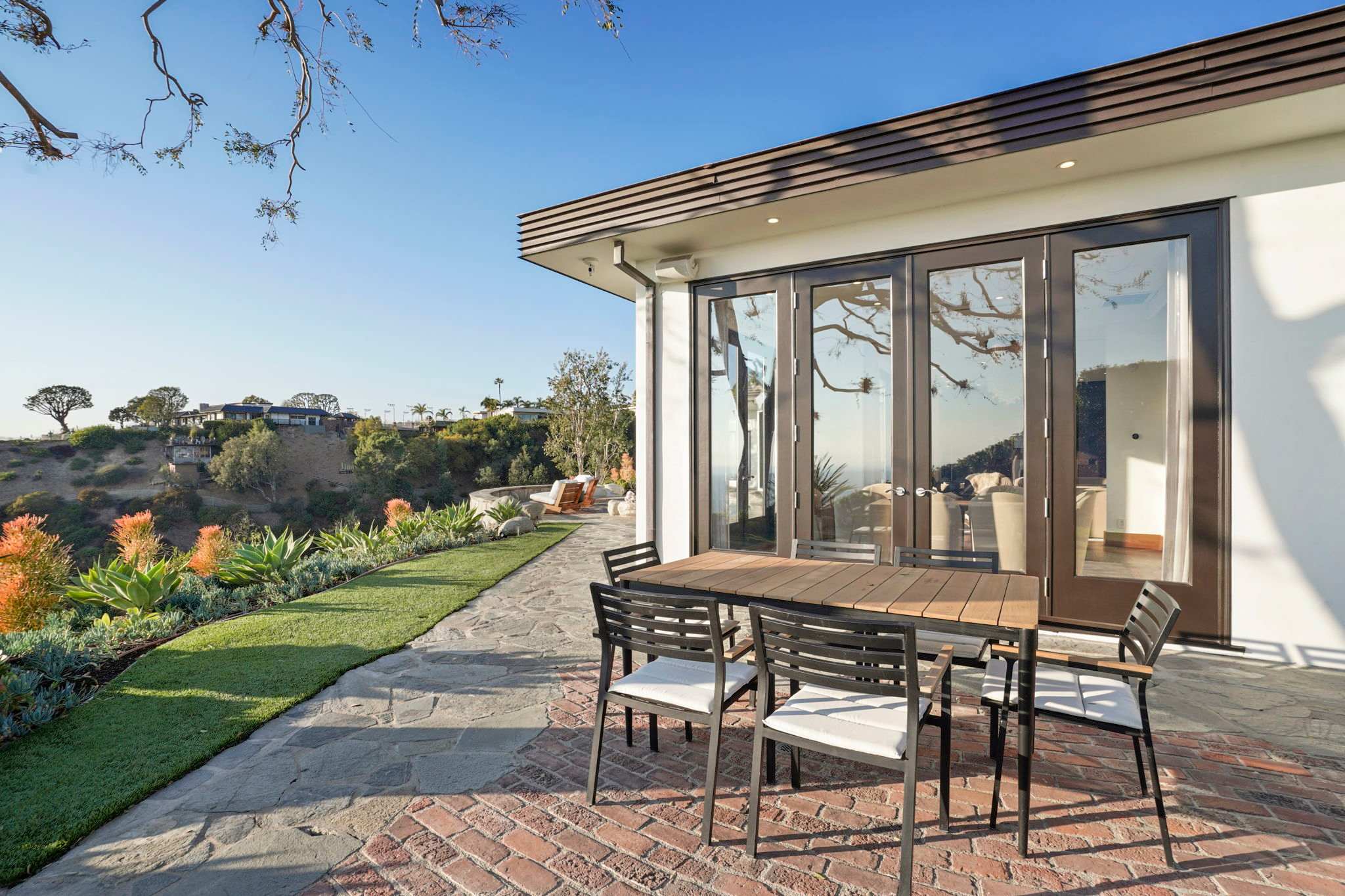 Enjoy meals outside on the spacious dining patio.
