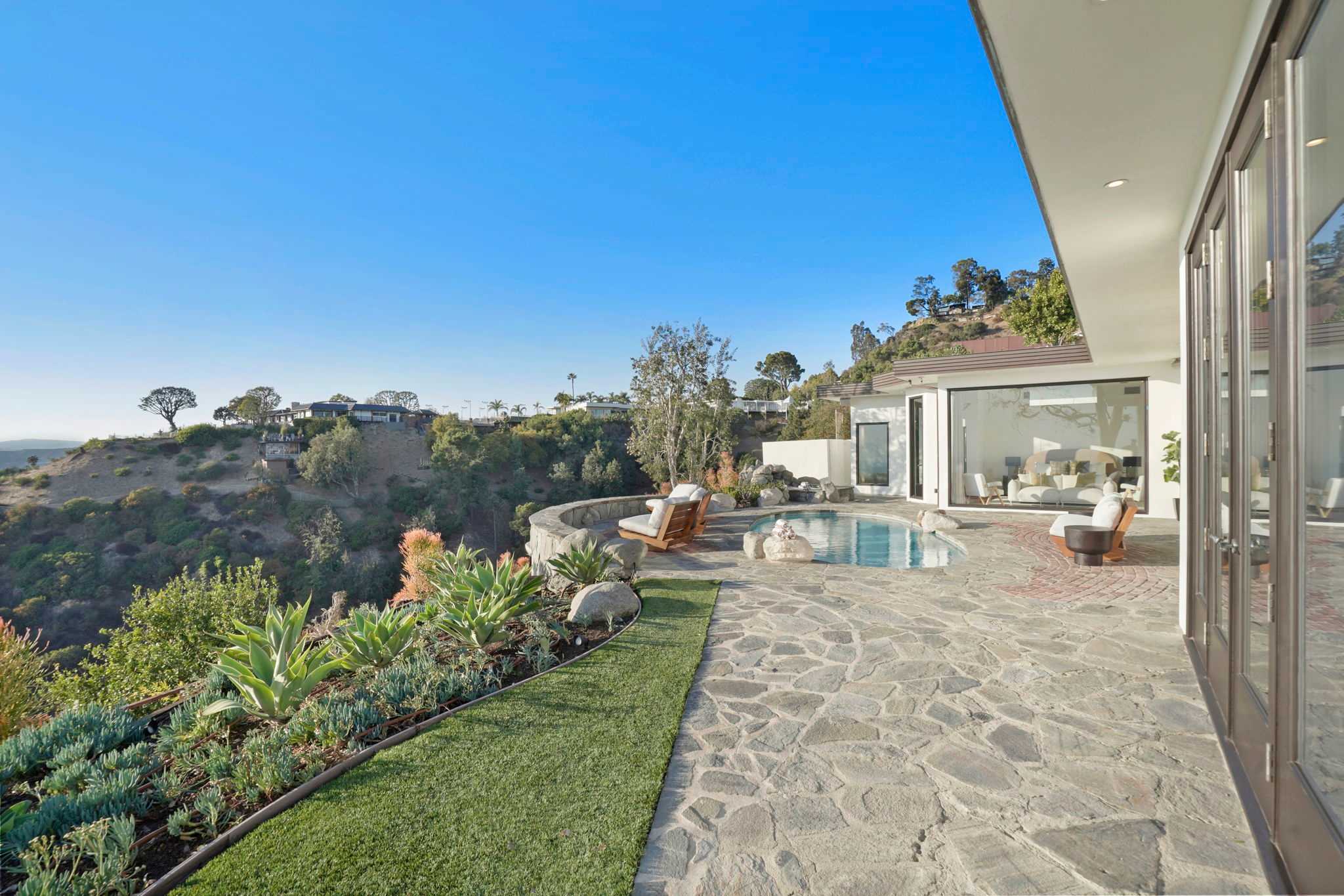 Host gatherings on the expansive stone terrace.