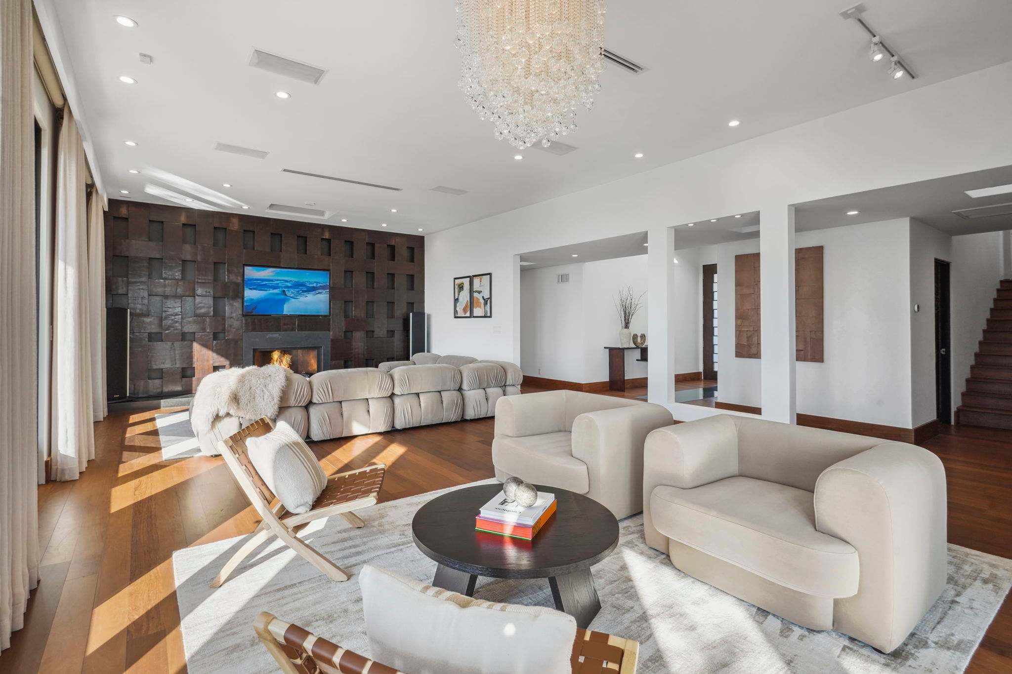 Relax on the Tufty-Time modular sofa surrounded by geometric wooden accents.