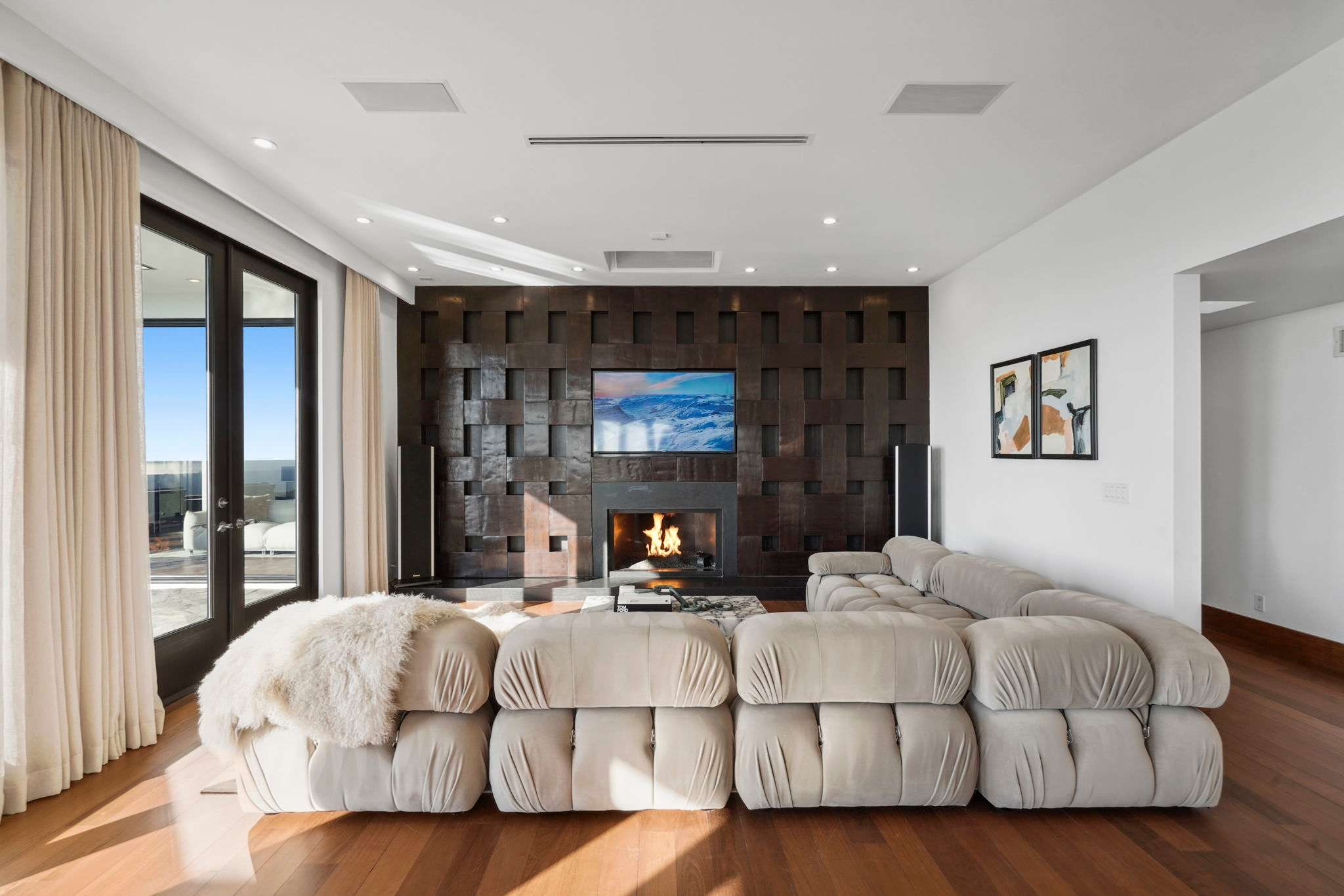 Sleek marble-clad fireplace - a centerpiece of warmth and elegance.