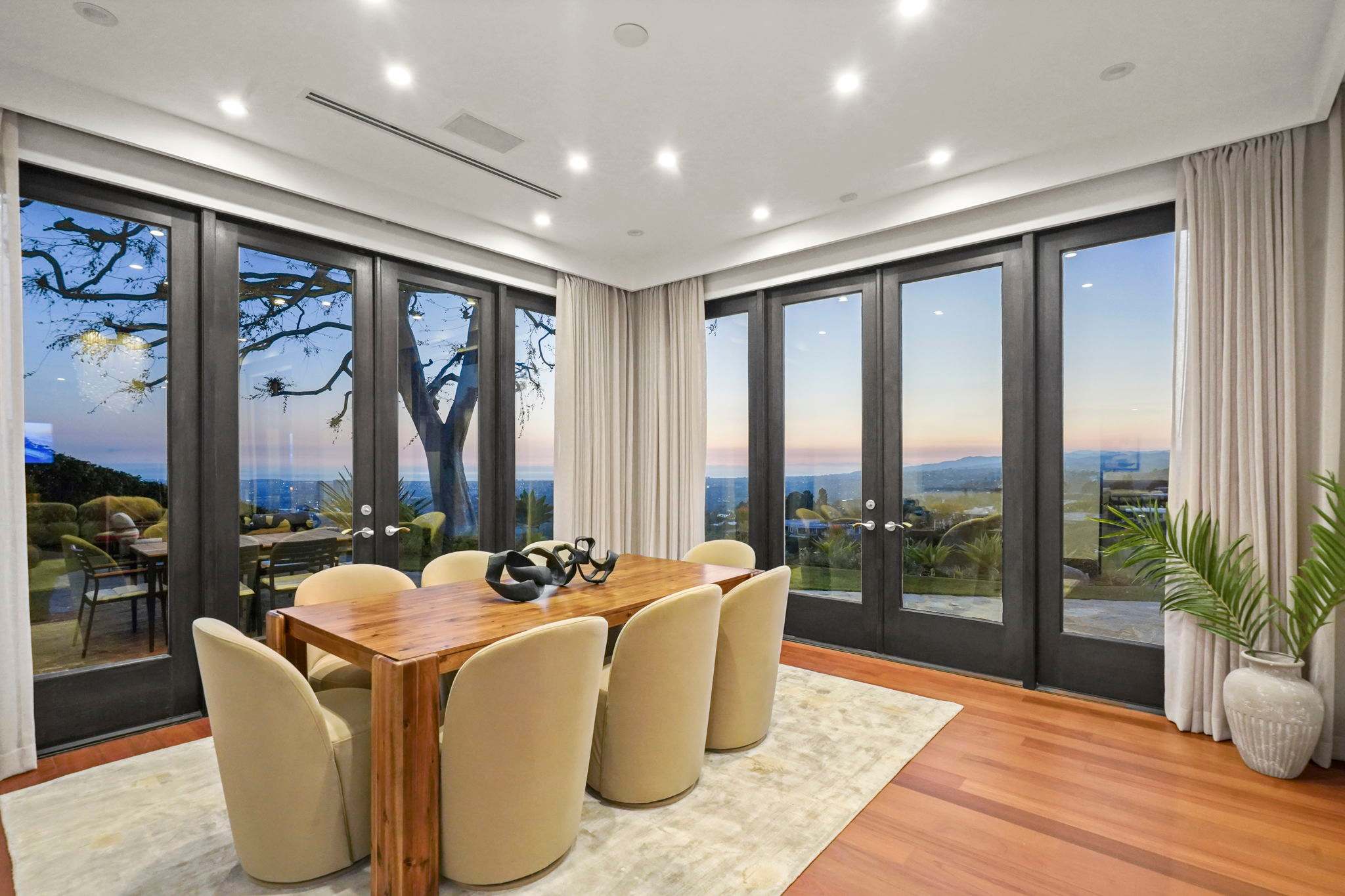 Gather around in a space that blends style, comfort, and scenery.