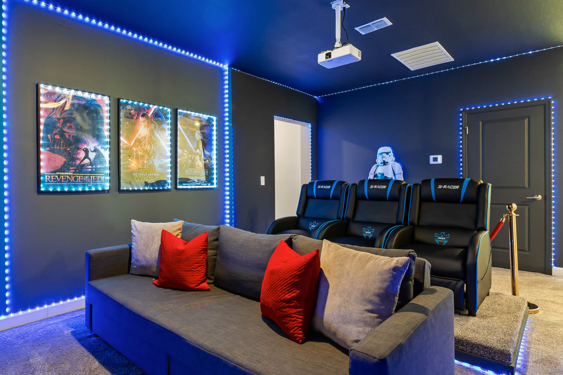 Cinematic Seating and Cool Mood Lighting in the Home Theater