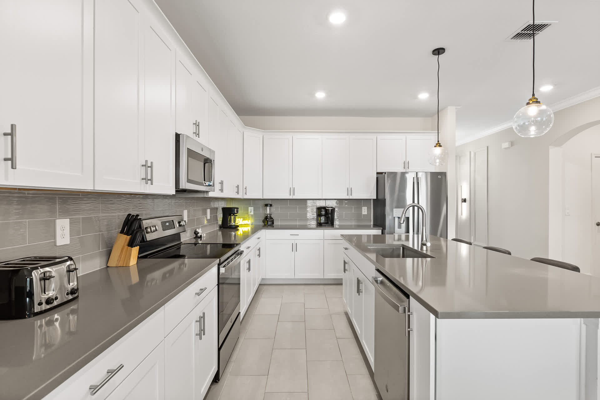 Modern-Fully Equipped Kitchen with Silver Appliances