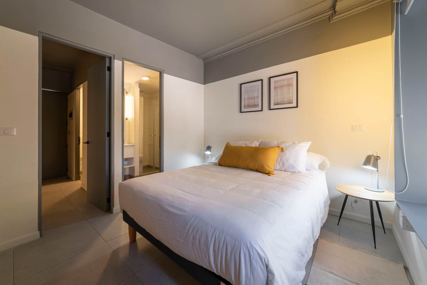 Unwind in this cozy studio bedroom with modern decor and a welcoming atmosphere, perfect for a restful retreat.