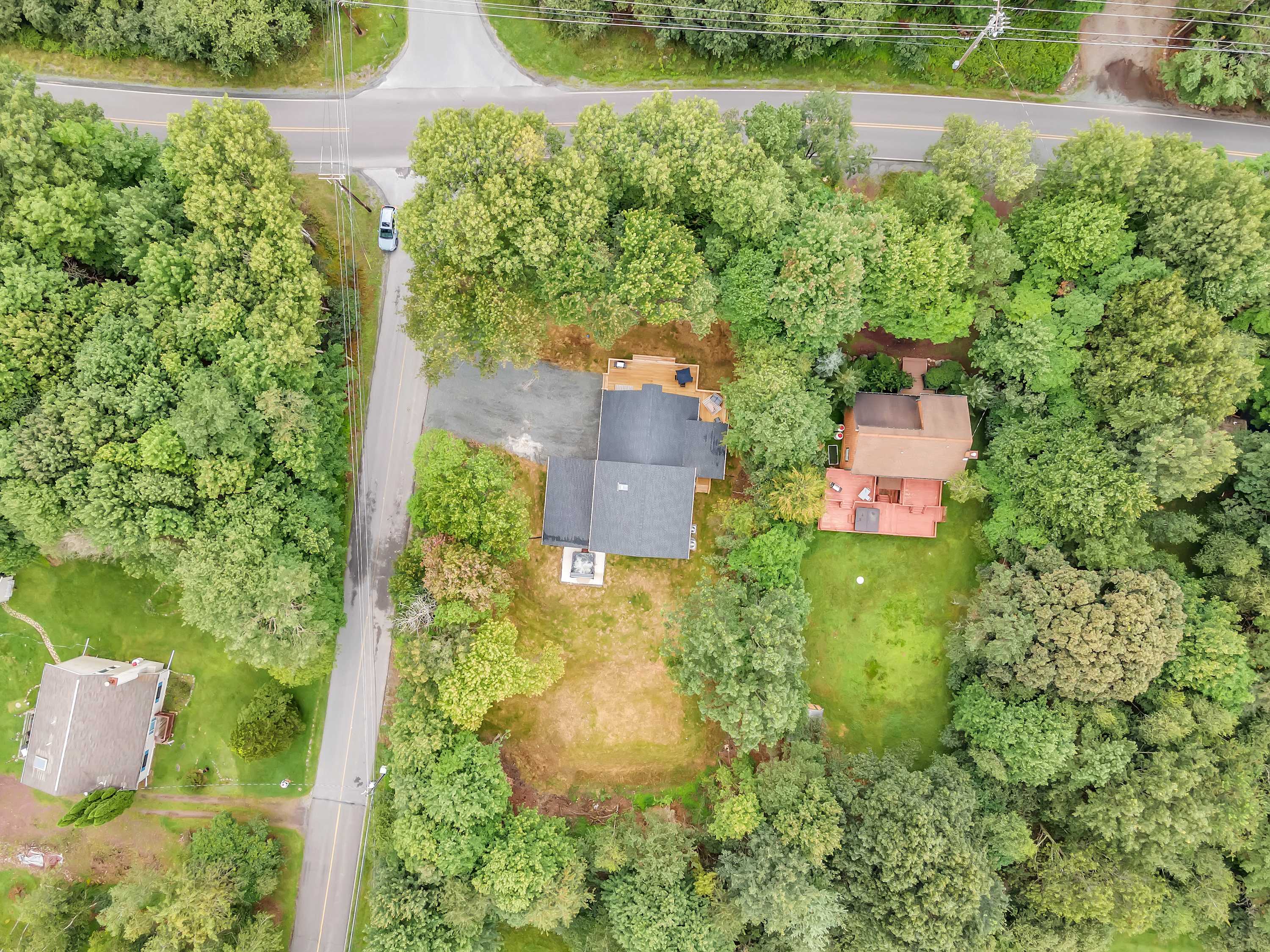 Aerial View of Your Private Escape – A breathtaking bird’s-eye view showcasing the expansive property, surrounded by lush greenery for total privacy and tranquility.
