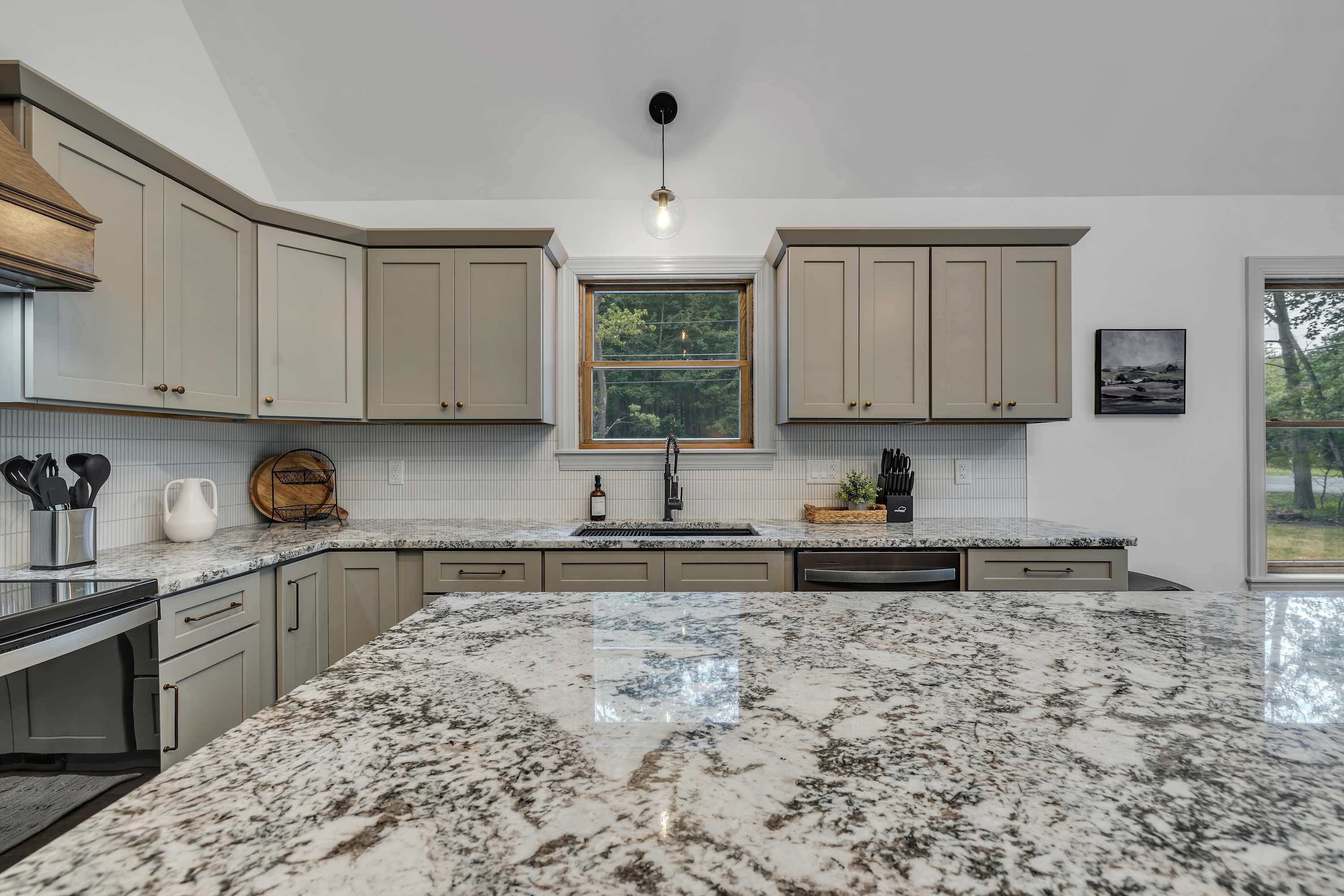 Chef's Dream Kitchen – Thoughtfully designed with ample counter space, open shelving, and high-end finishes for a seamless cooking experience.