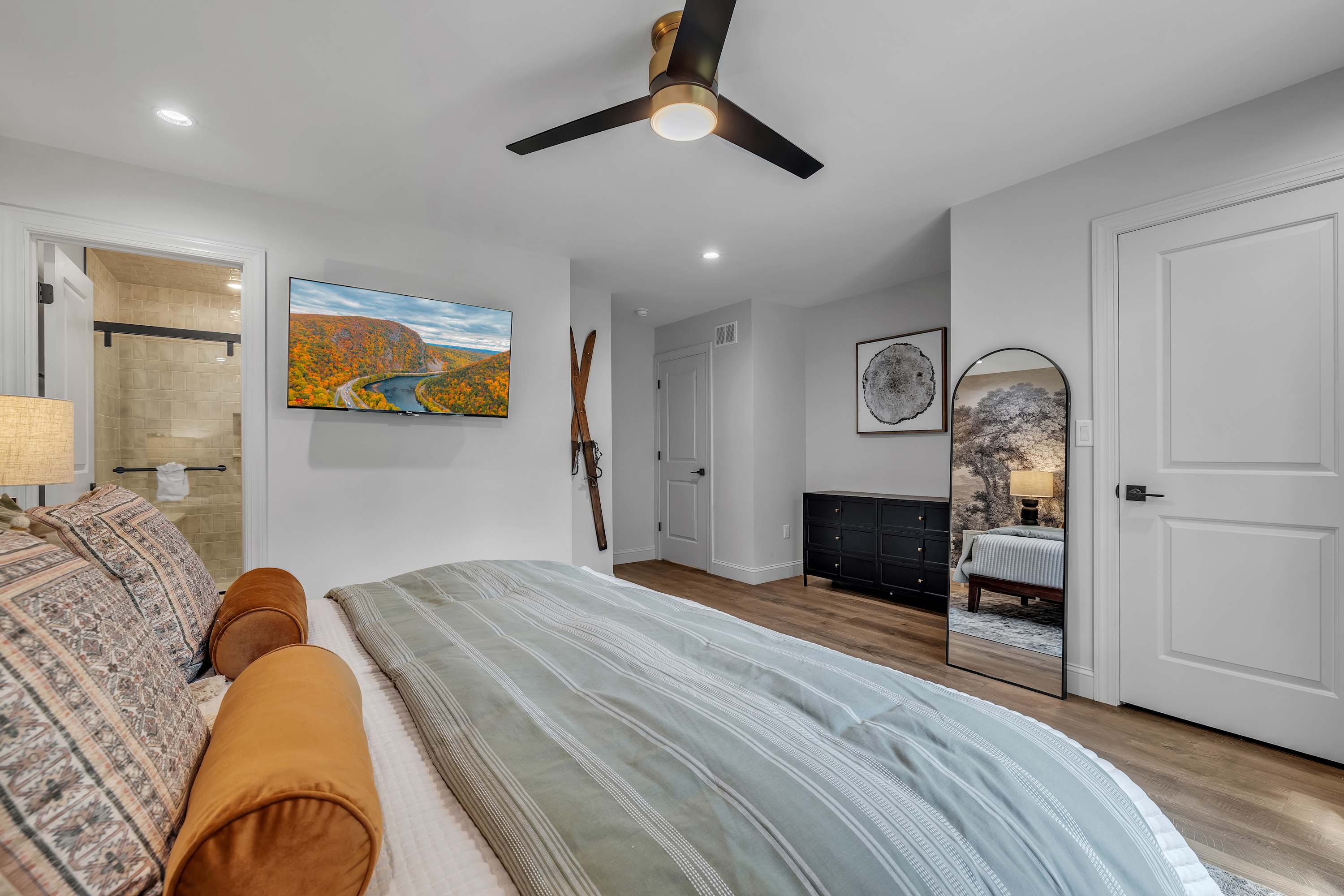 Spacious & Inviting Second Bedroom – A cozy retreat featuring warm tones, stylish decor, and plenty of space to relax after a long day.