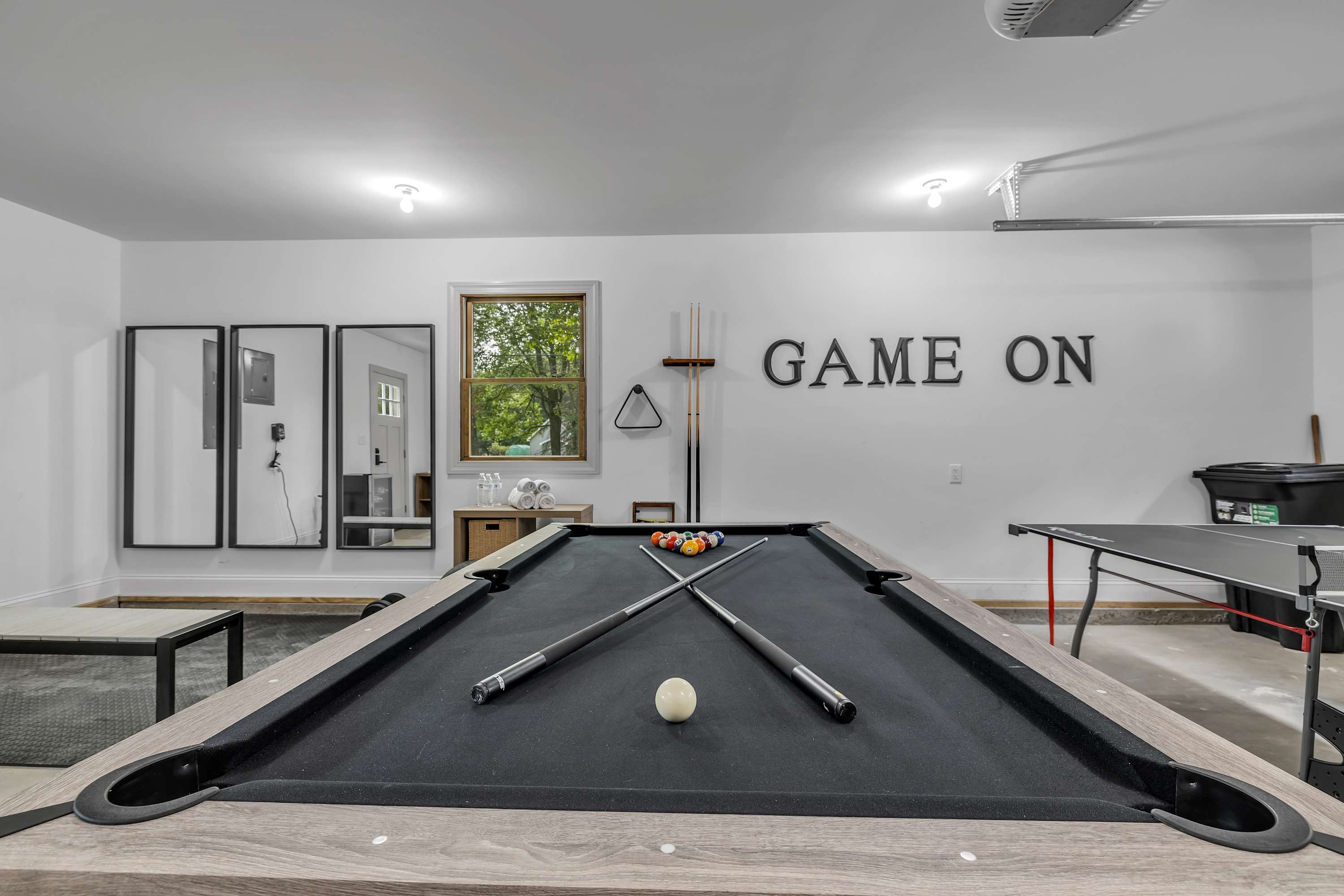 Billiards & Ping Pong Showdown – A dual-purpose rec space featuring both a pool table and ping pong setup, making it the ultimate gaming retreat.