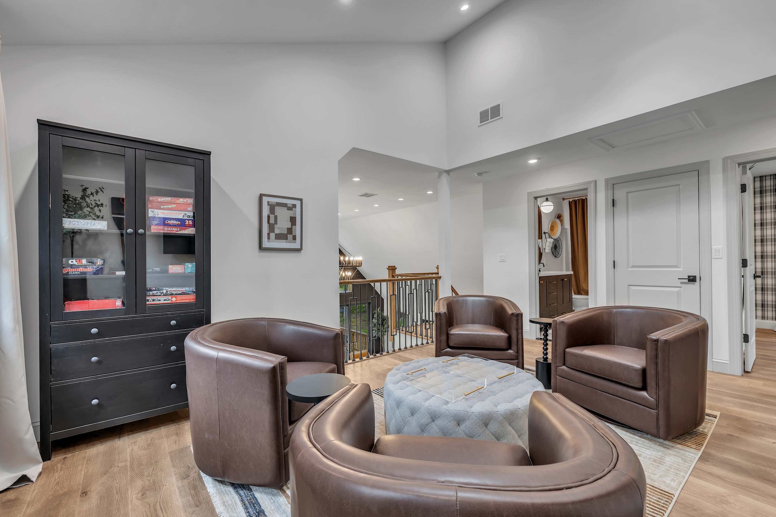 Game & Lounge Corner – A fun and functional loft space with game storage, comfy seating, and a relaxed atmosphere for casual gatherings.