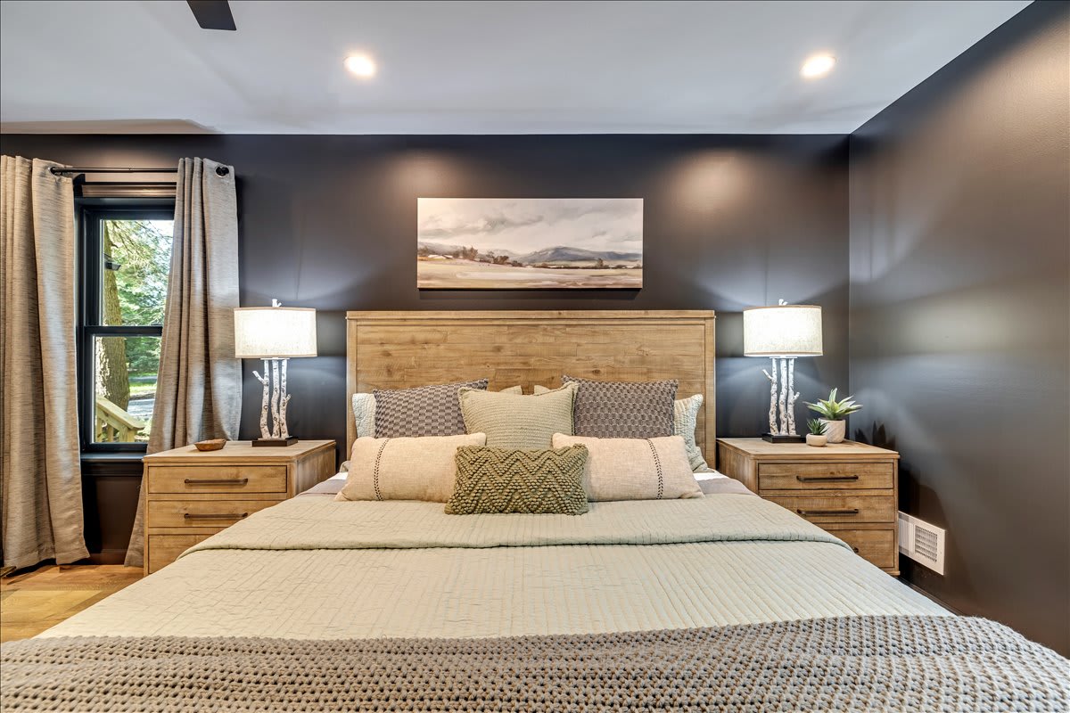 Wake up refreshed in the king bed of this calming and beautifully decorated bedroom.