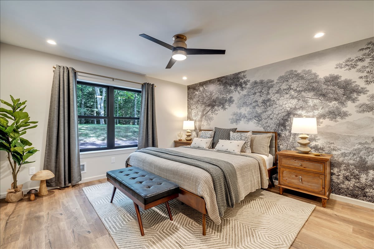 Experience refined comfort in the master suite with a king bed, private full bathroom, and Roku TV