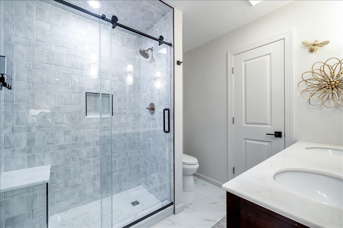 Modern master bathroom with all essentials provided for a comfortable stay