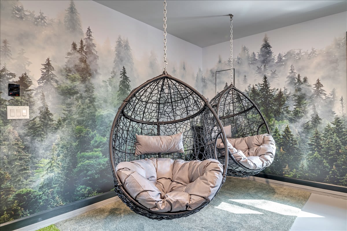 Spectate the game room contests from these comfy lounge chairs