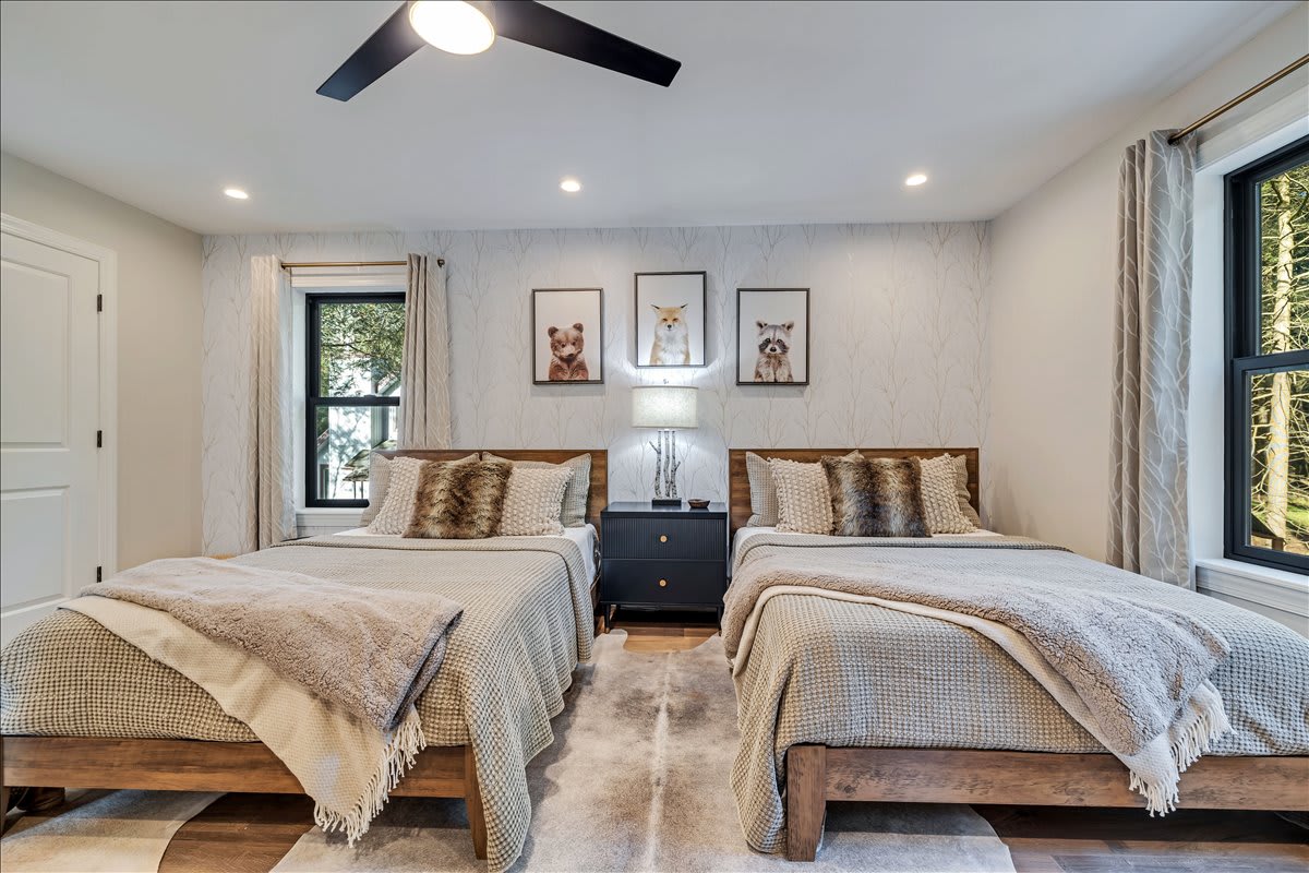 Complete with a Roku TV, work desk, and ceiling fan, bedroom 3 provides all the comforts of home