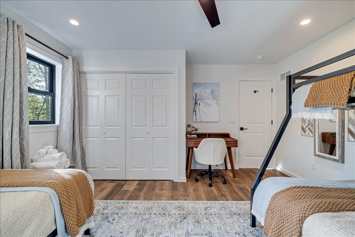 An expansively designed family bedroom for you and yours to enjoy.