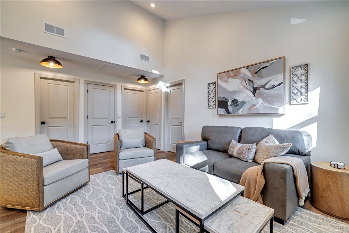 Lounge in style with plush seating and modern decor.