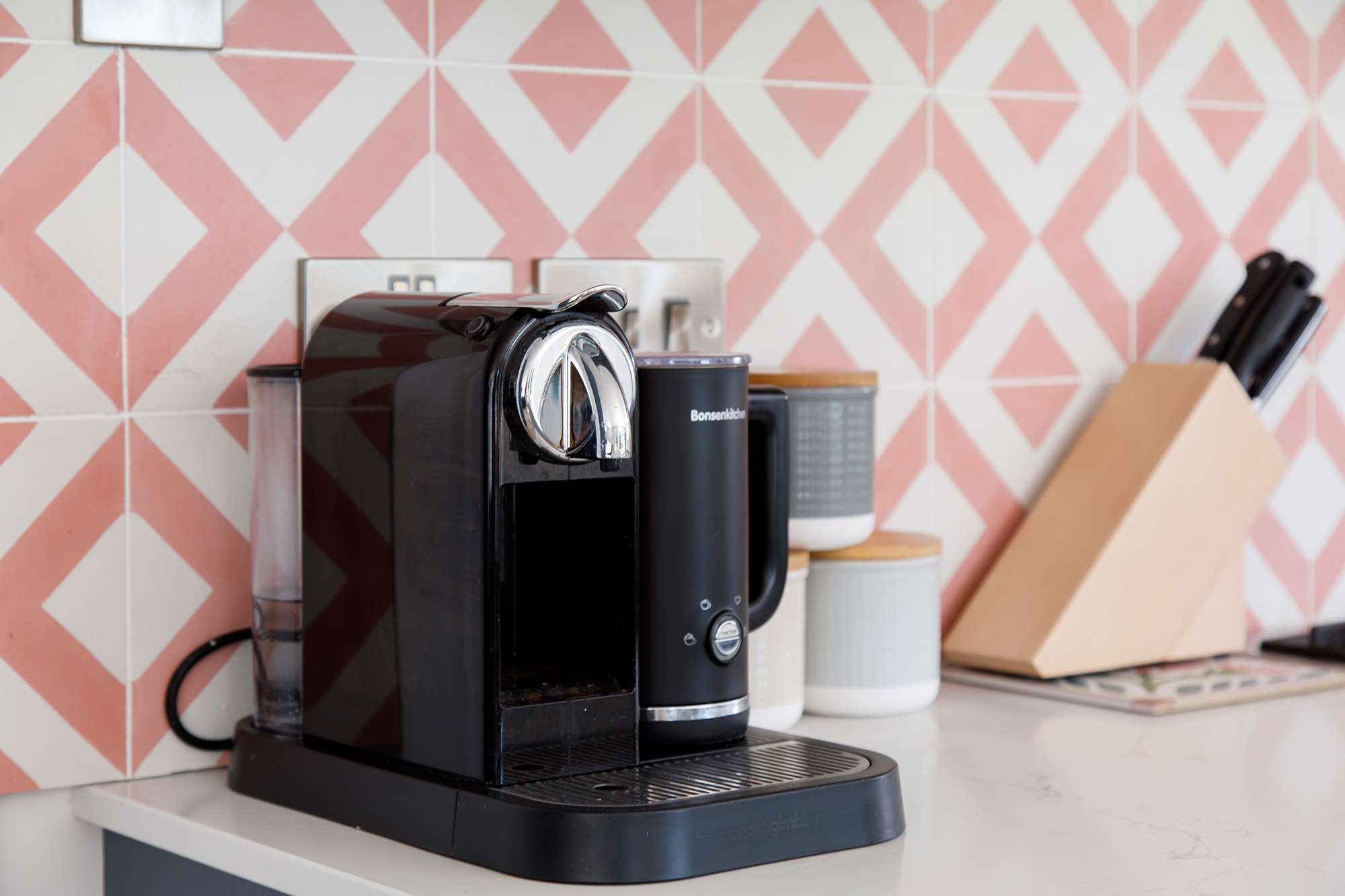 The home has a Nespresso machine for the coffee lovers.