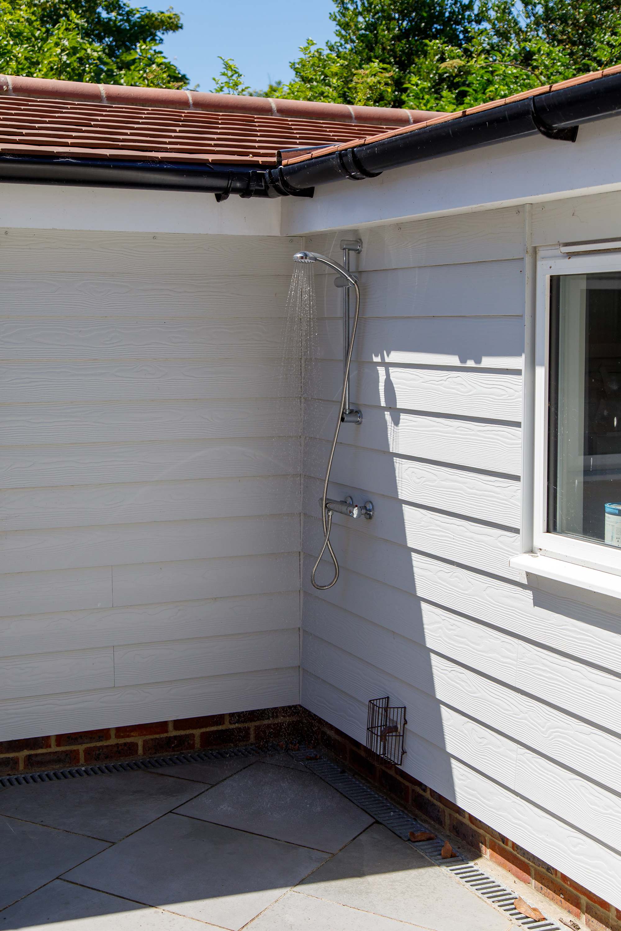 Rinse off under the outside shower after a day at the beach or a morning sea swim.