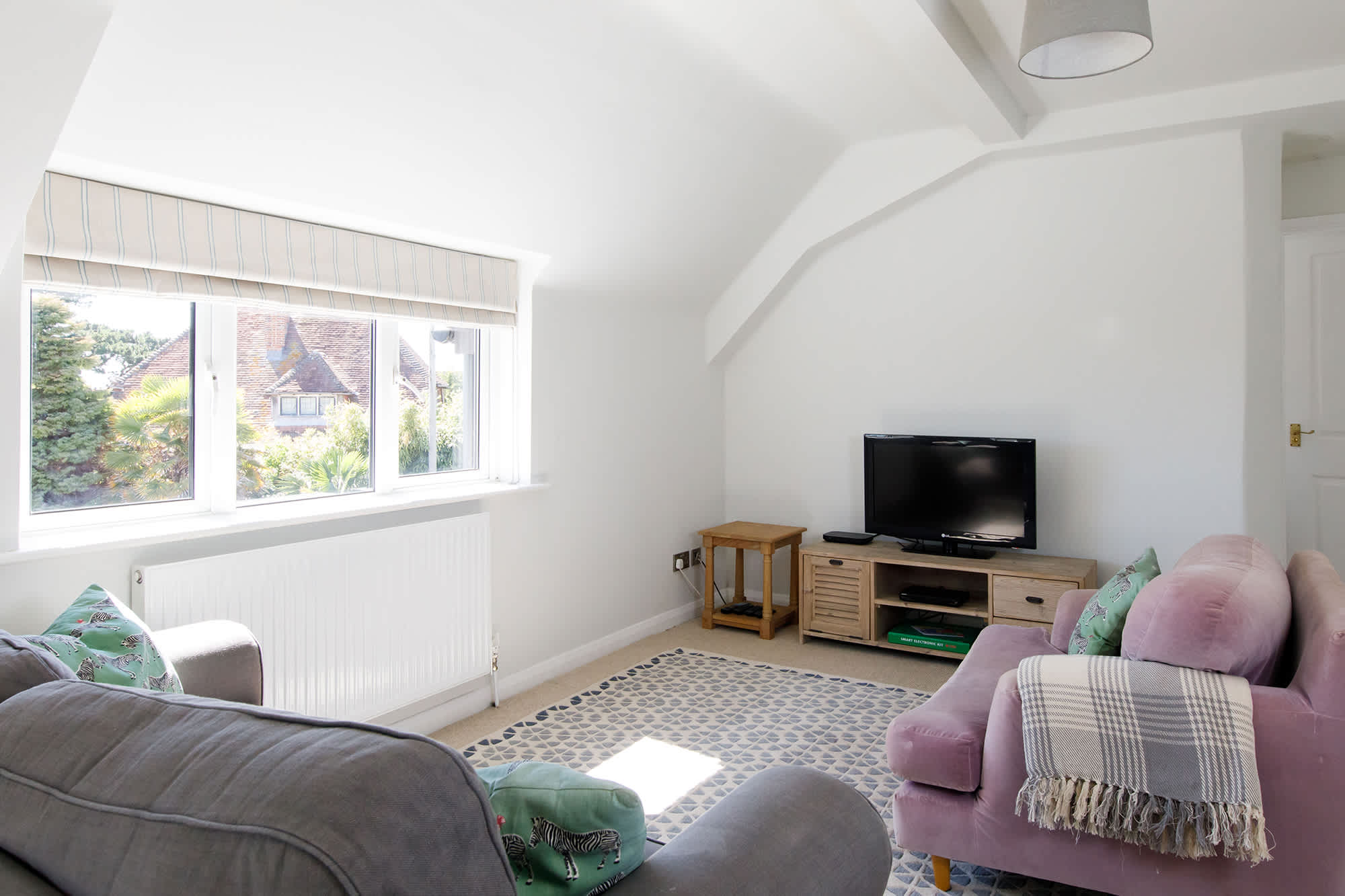 The upstairs lounge area is a lovely spot to read, talk or snooze!