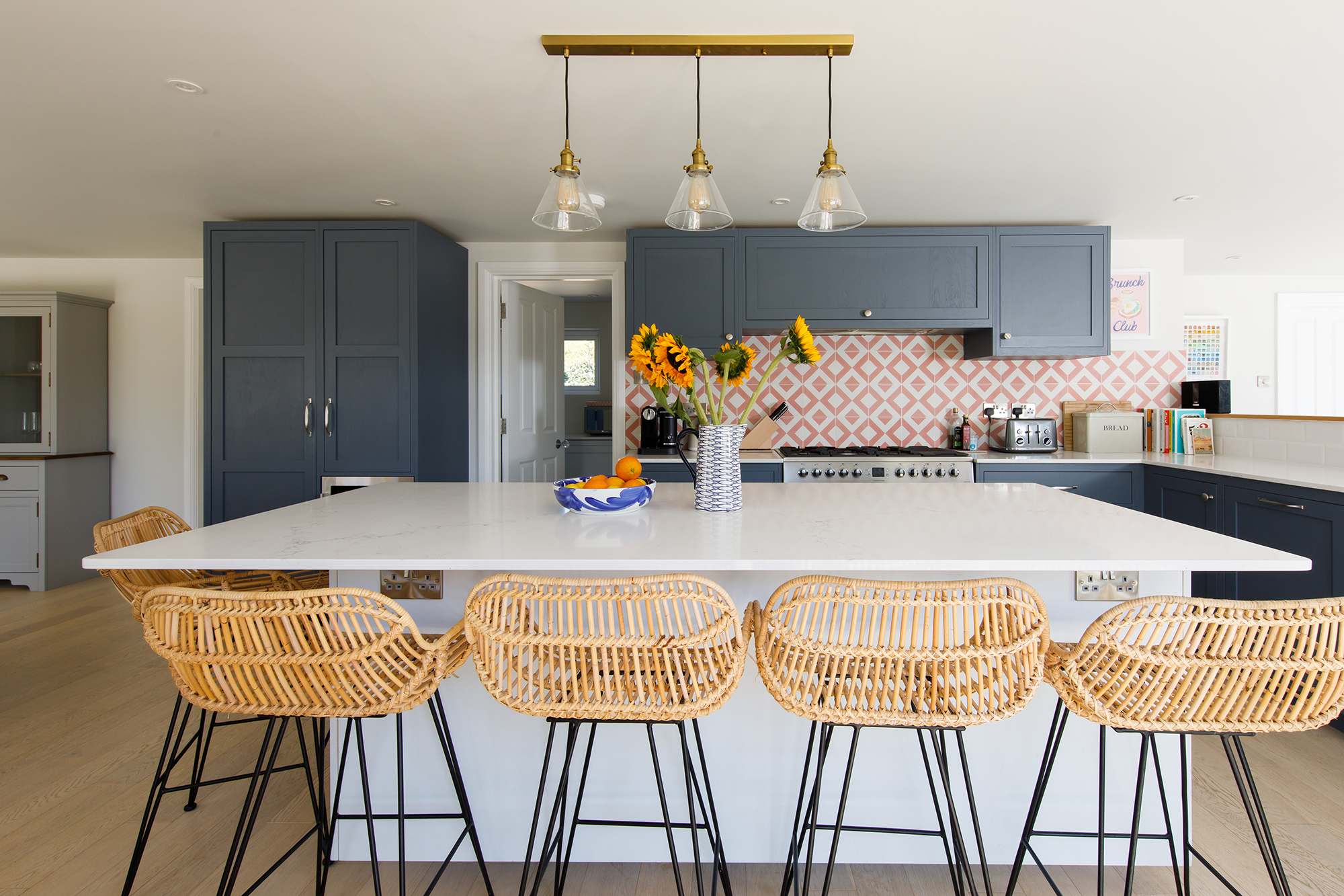 The central island has a breakfast bar to seat up to 4 people. Gather round in the evenings for drinks or enjoy a bite for breakfast.