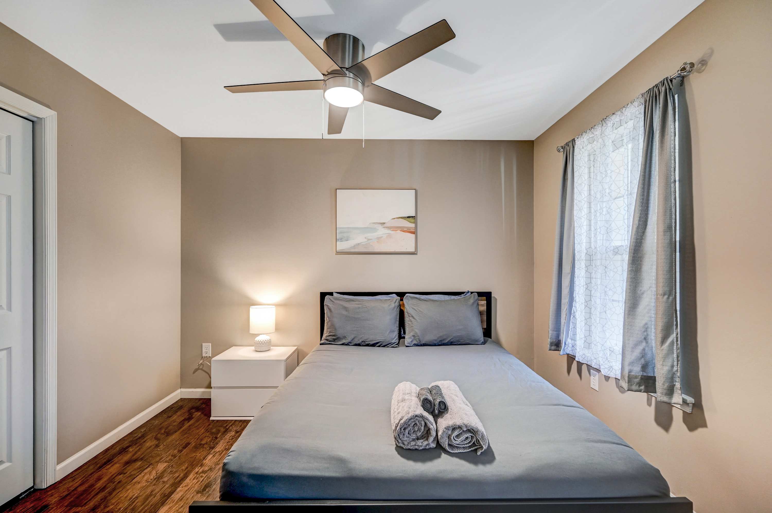 Your Perfect Sleep Sanctuary! Cozy up in this thoughtfully styled space, complete with plush bedding, natural light, and a calming atmosphere.