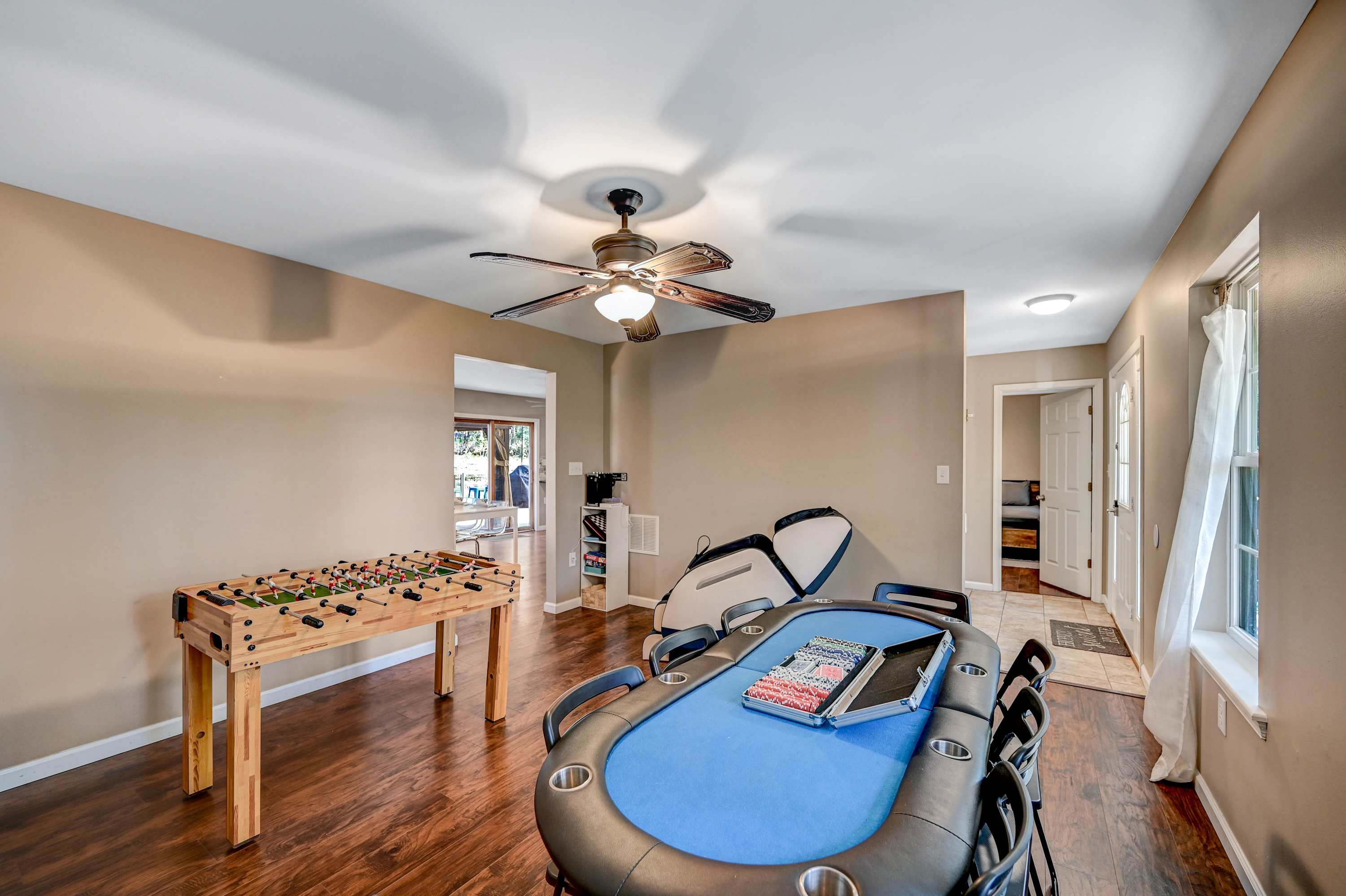 Play & Relax! A dedicated game room with a poker table and foosball setup, perfect for friendly competition and making memories.