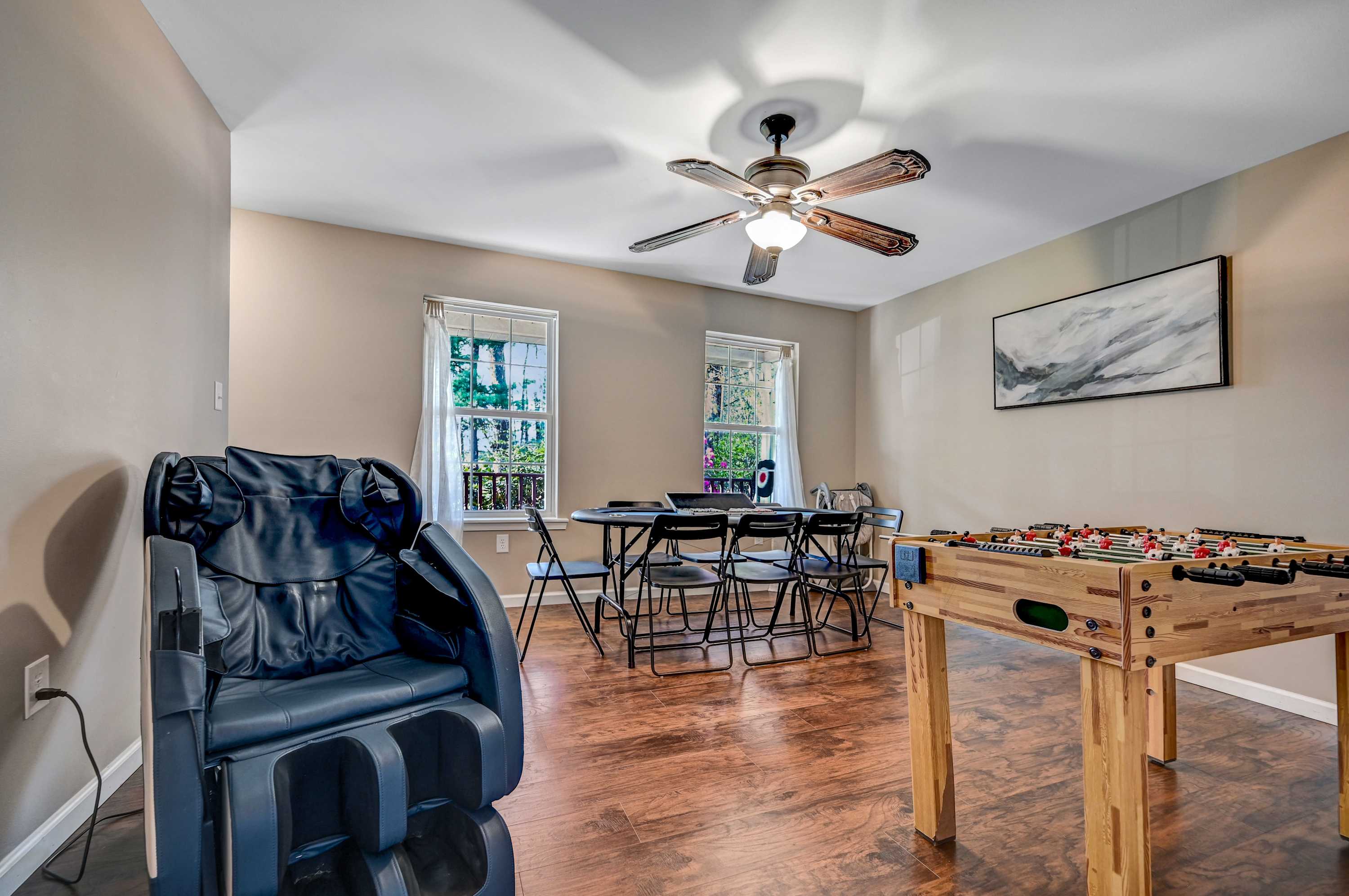 The Ultimate Chill Zone! Whether you’re unwinding in the massage chair or getting competitive at the foosball table, this cozy hangout spot is perfect for making memories.