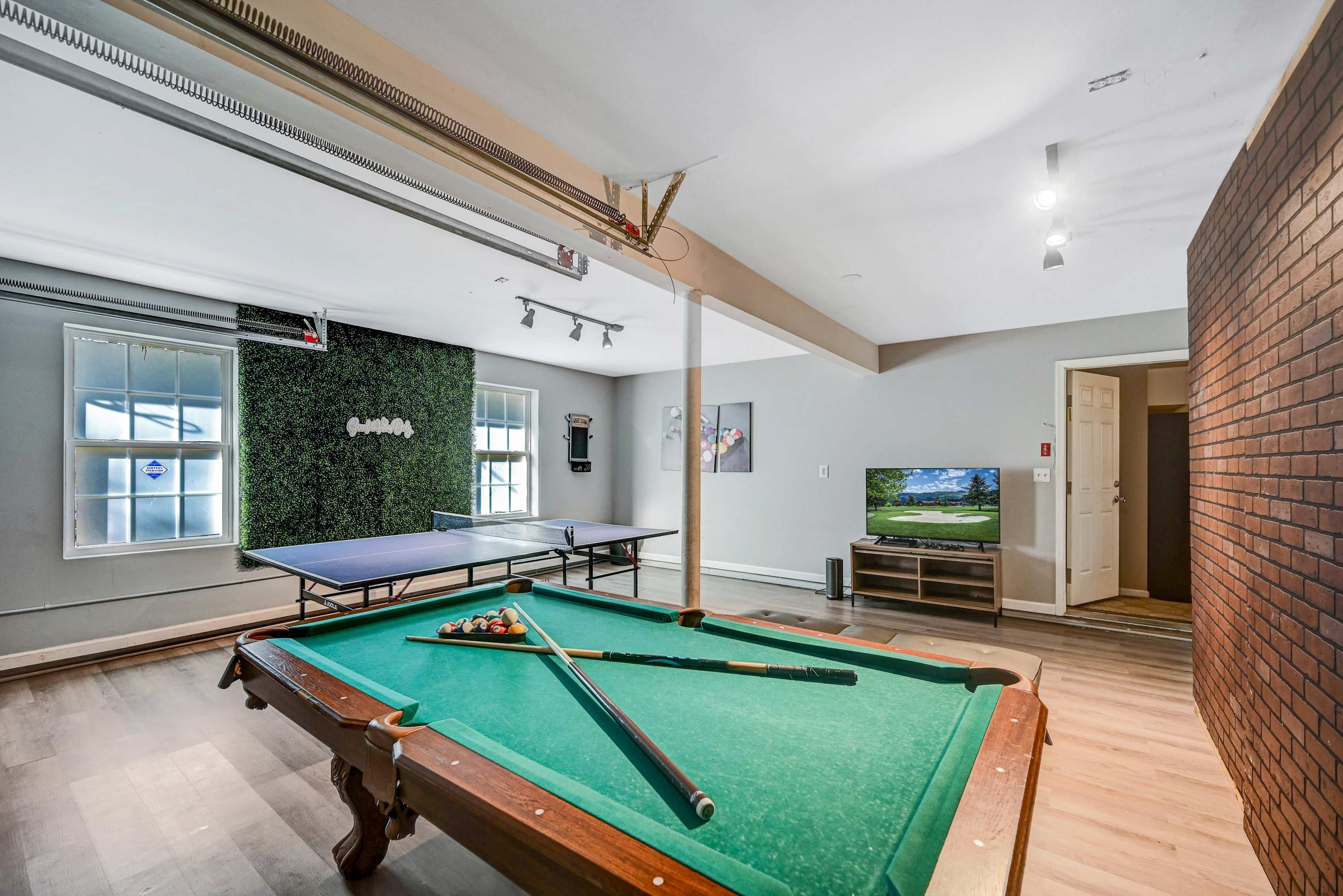 The Ultimate Hangout Spot! Pool table, ping-pong, and a cozy TV setup, perfect for family and friends to enjoy together.