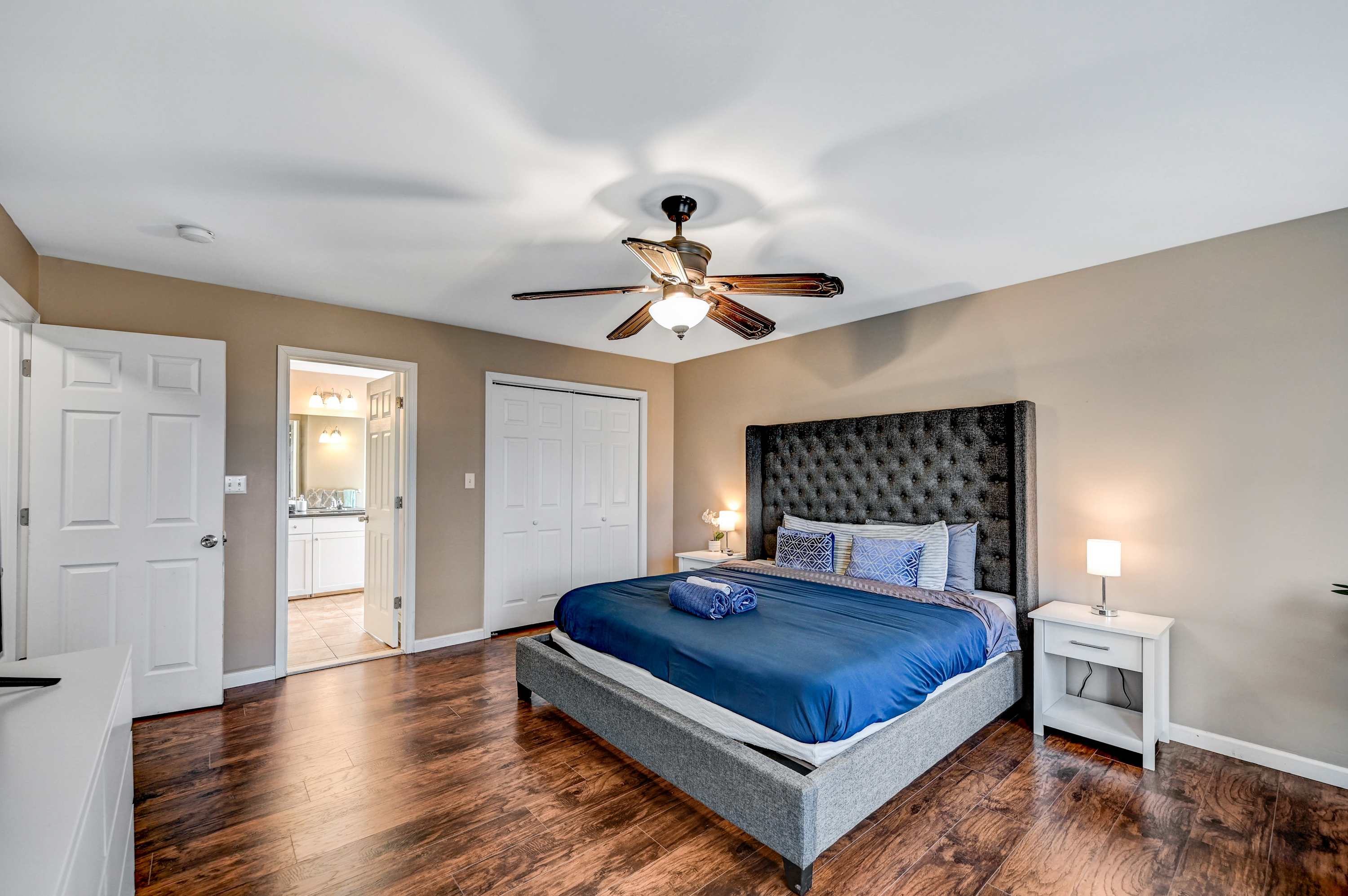 Your Private Oasis! With a grand bed, modern touches, and an ensuite just steps away, this room is perfect for resting and recharging in total comfort.
