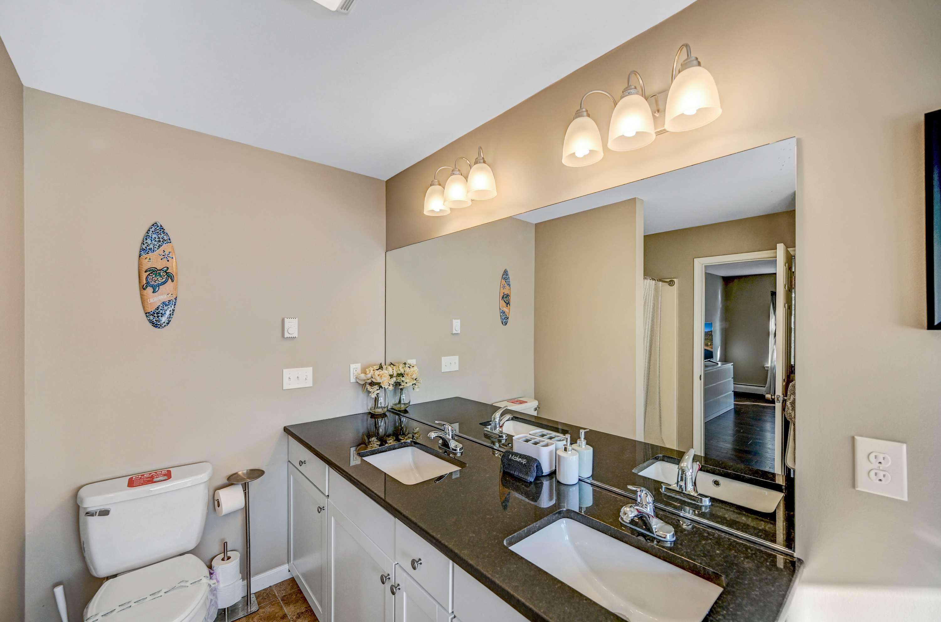 Effortless Comfort! Whether you're prepping for the day or winding down at night, this stylish and airy bathroom provides the perfect space to refresh and recharge.