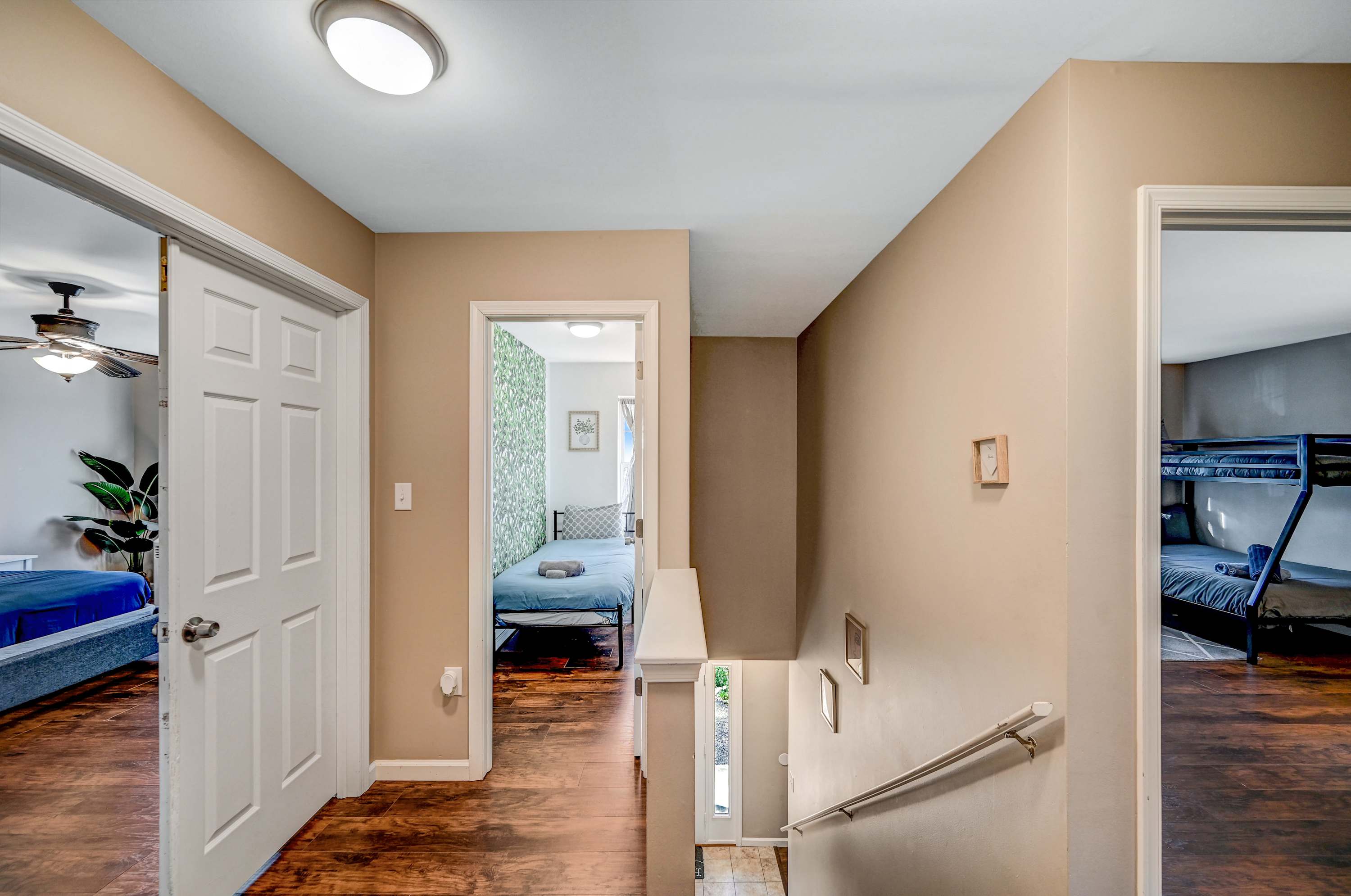 Central Hub to Comfort! A bright, welcoming landing that guides you to each cozy bedroom.