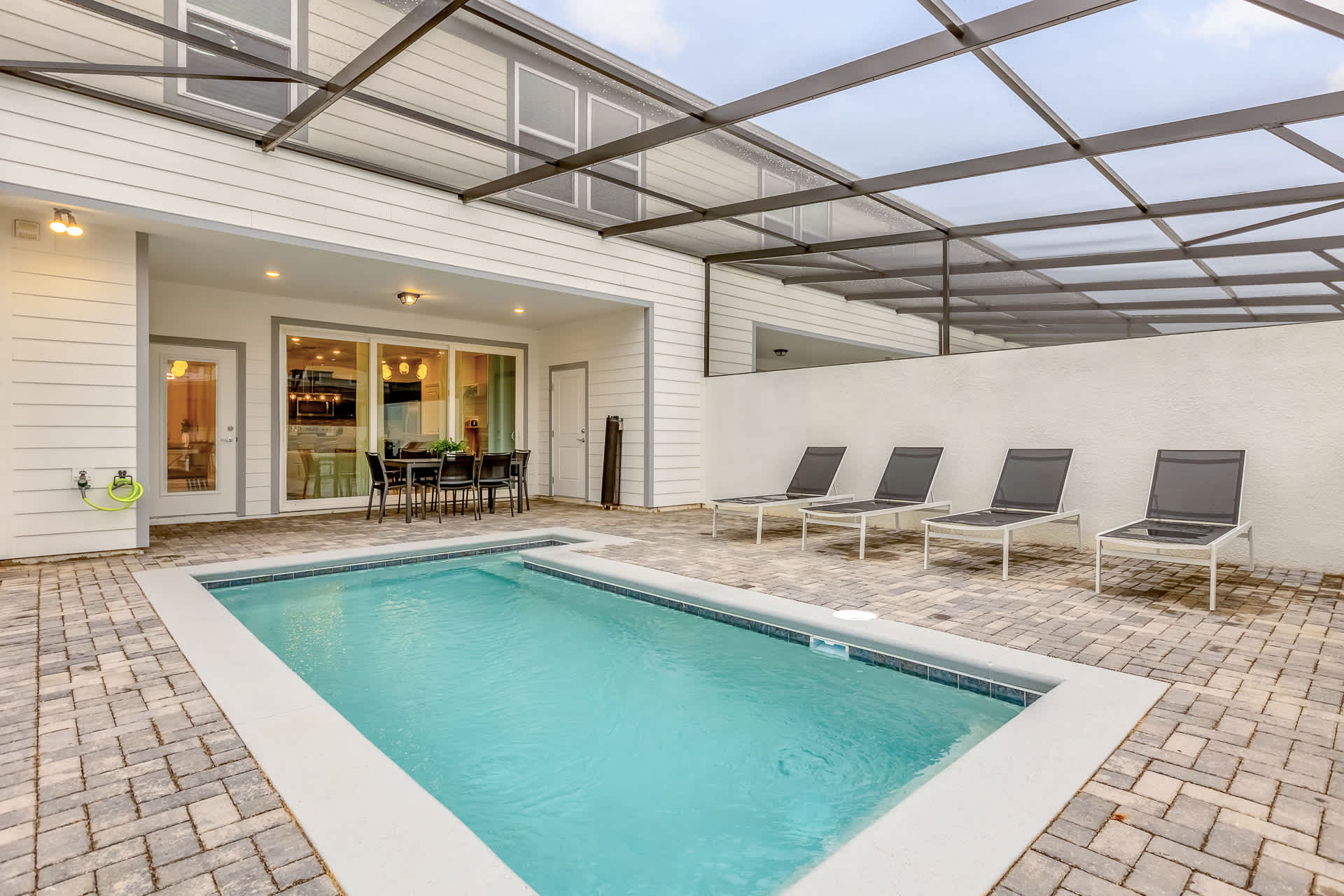 Private Pool with Covered Patio and Outdoor Dining Area